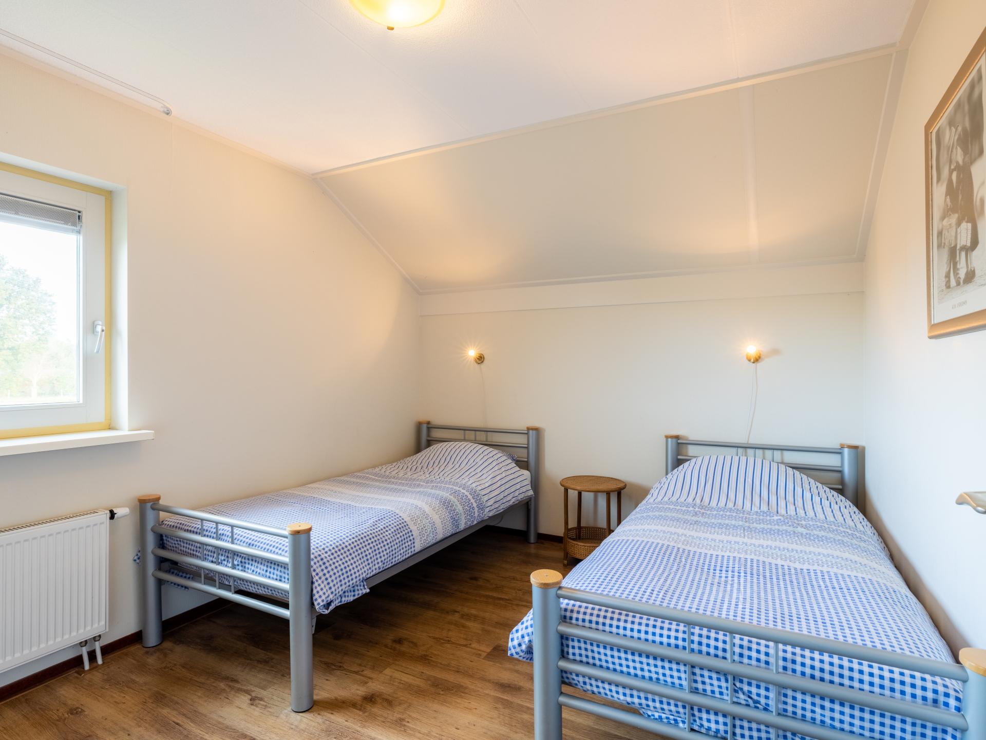 Vrijstaand vakantiehuis met aanlegsteiger aan de Friese meren in Koudum - foto 10