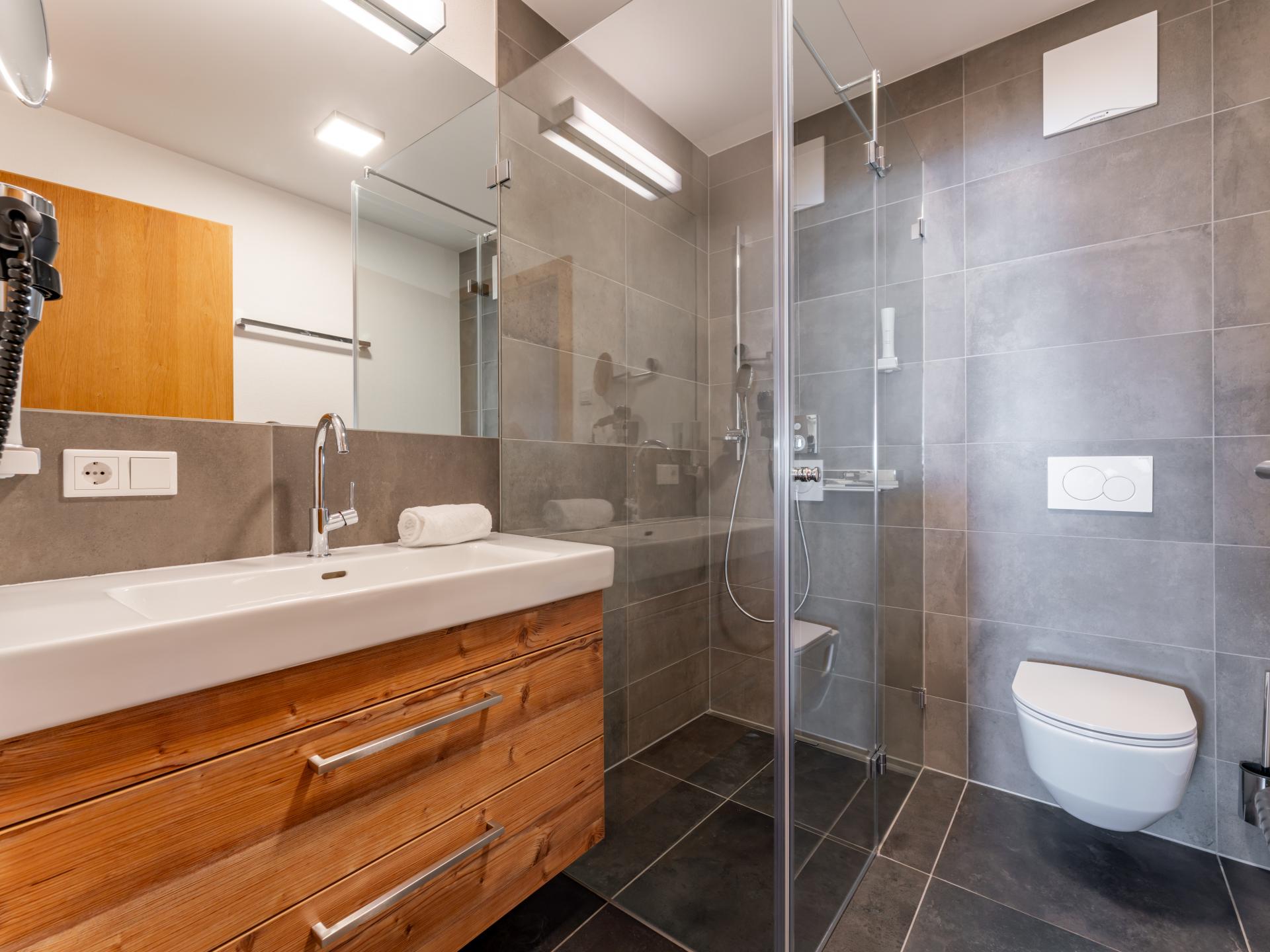 Aan de piste: Modern appartement in het centrum van Piesendorf - foto 15