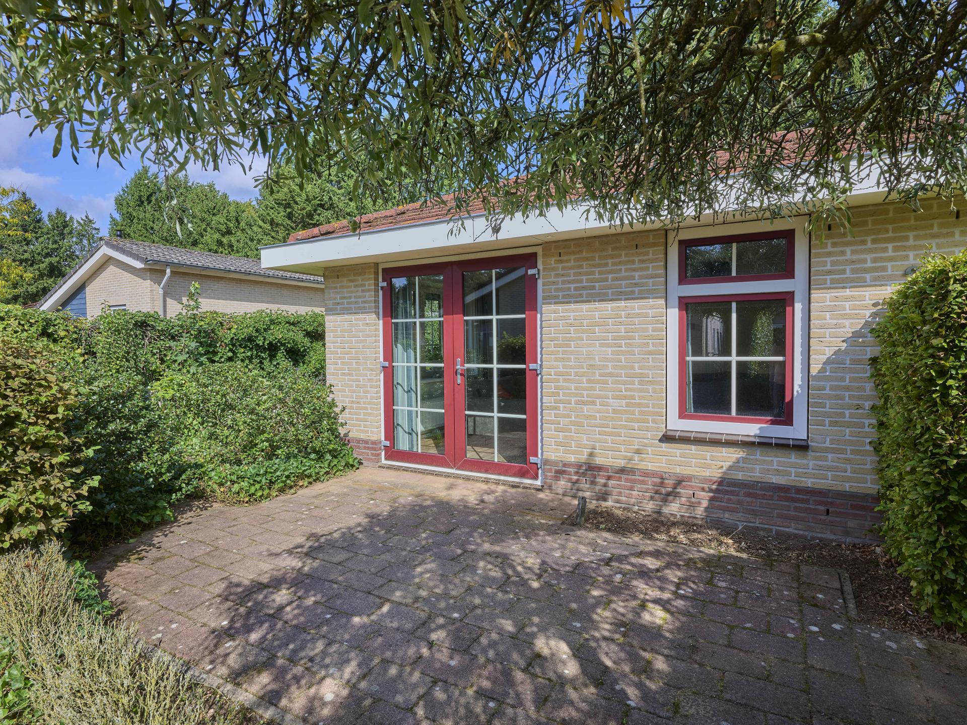Vrijstaande villa aan bosrand op Veluws vakantiepark voor 8 personen - foto 36