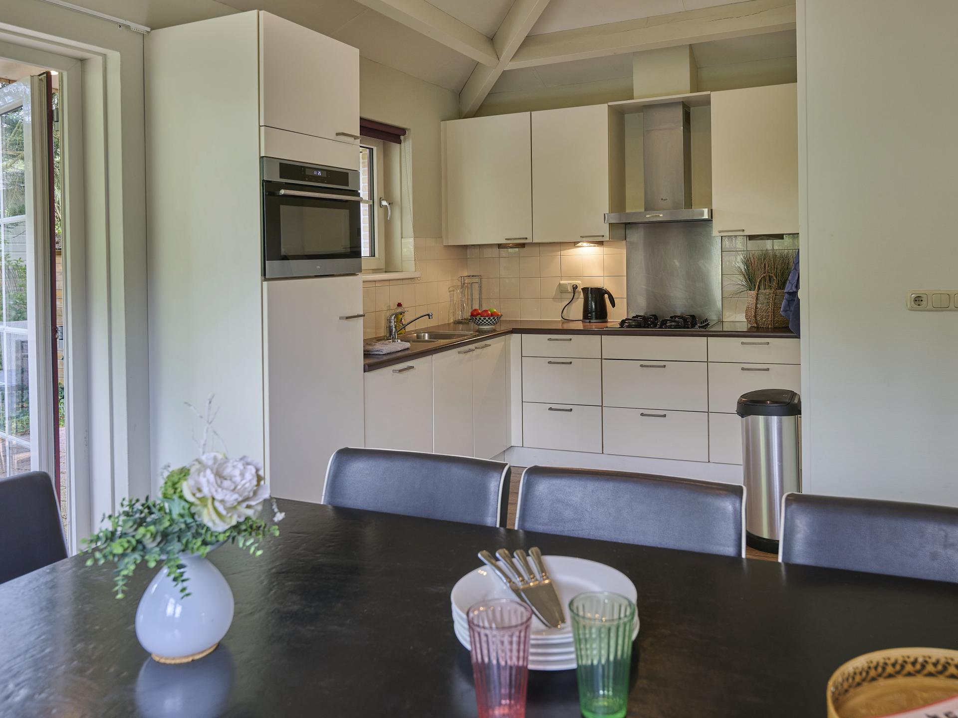 Vrijstaande villa aan bosrand op Veluws vakantiepark voor 8 personen - foto 4