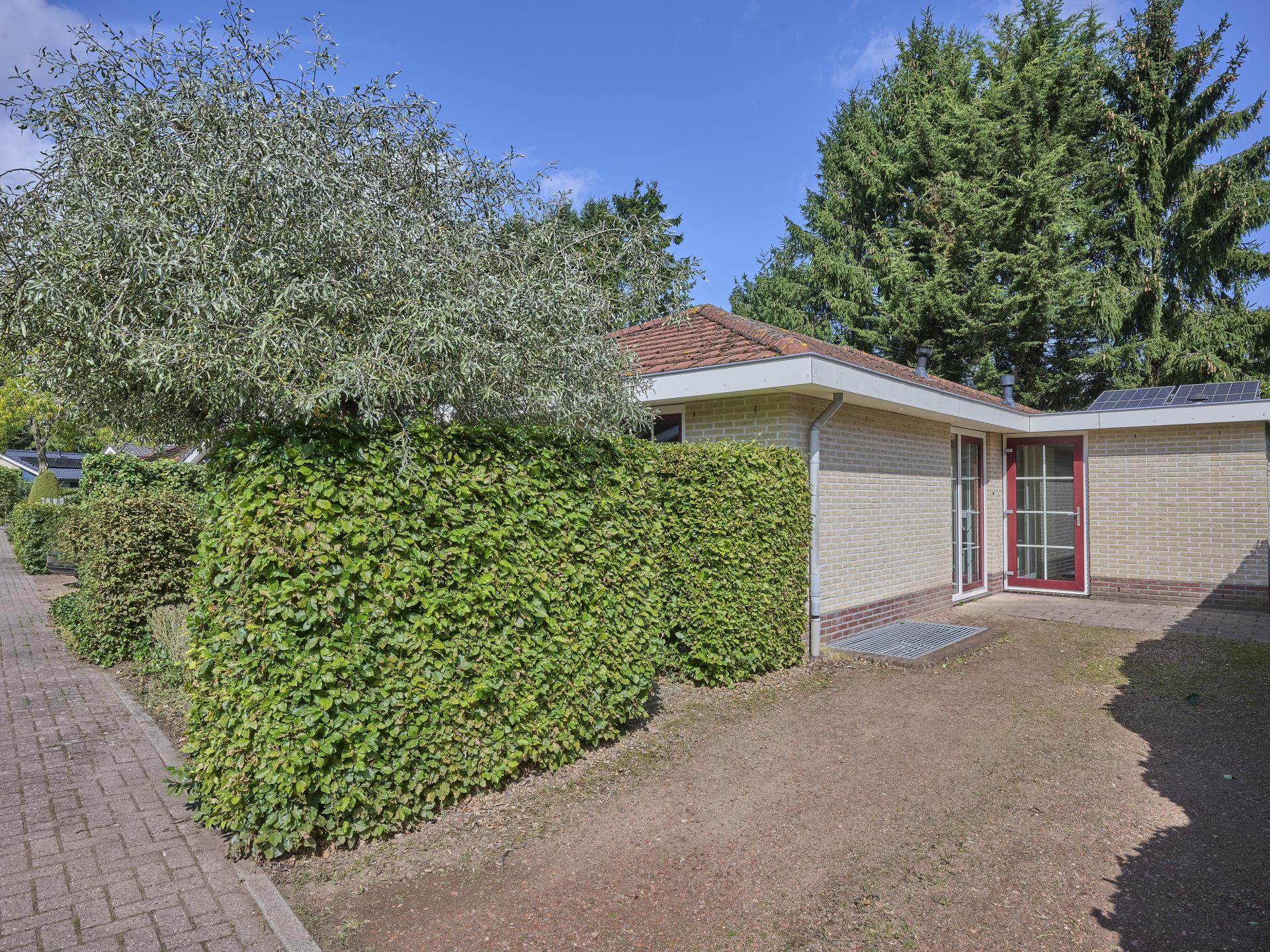 Vrijstaande villa aan bosrand op Veluws vakantiepark voor 8 personen - foto 33