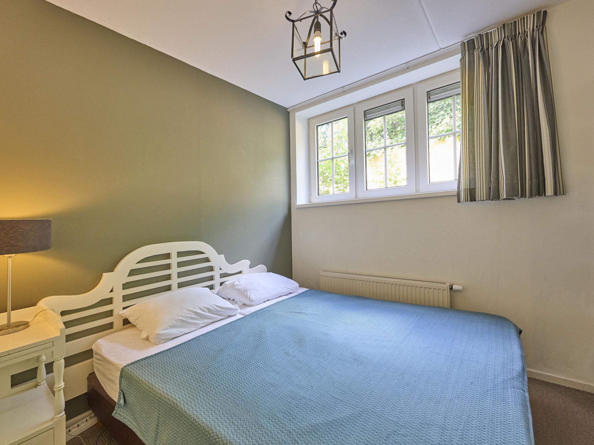 Vrijstaande villa aan bosrand op Veluws vakantiepark voor 8 personen - foto 7