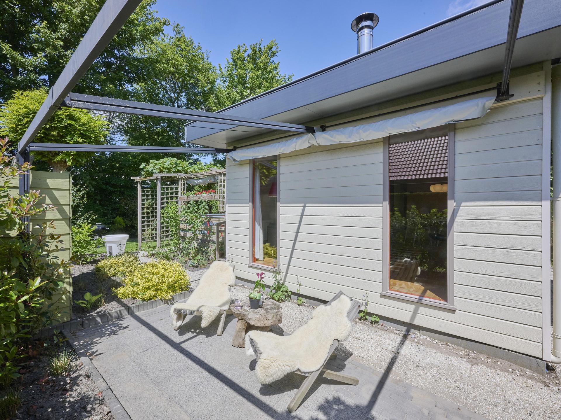 Knus chalet met grote tuin op kleinschalig park nabij strand Goedereede - foto 32
