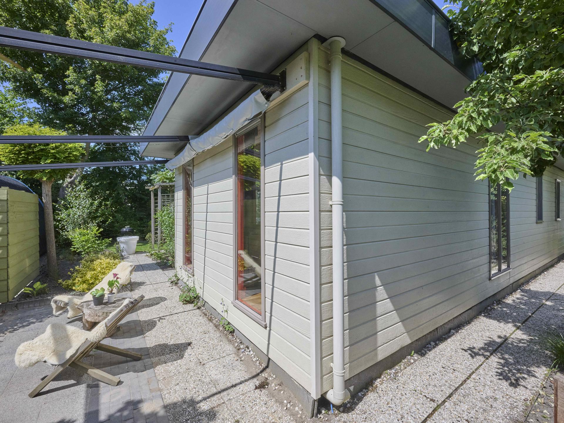 Knus chalet met grote tuin op kleinschalig park nabij strand Goedereede - foto 31