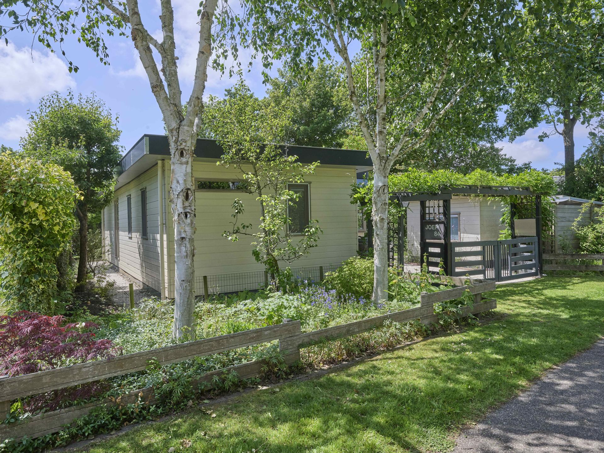Knus chalet met grote tuin op kleinschalig park nabij strand Goedereede - foto 24