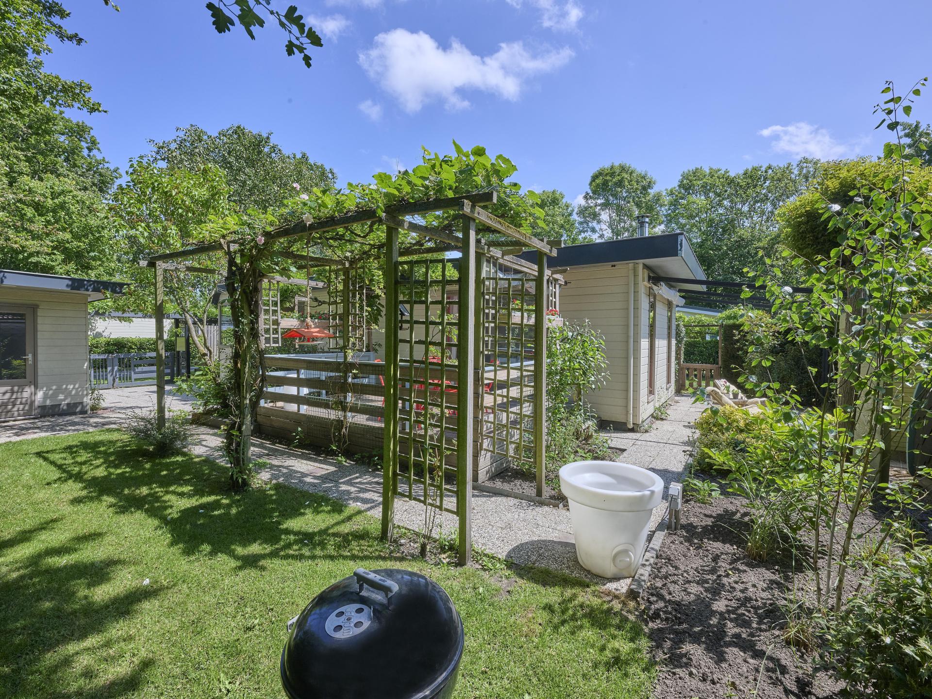Knus chalet met grote tuin op kleinschalig park nabij strand Goedereede - foto 33