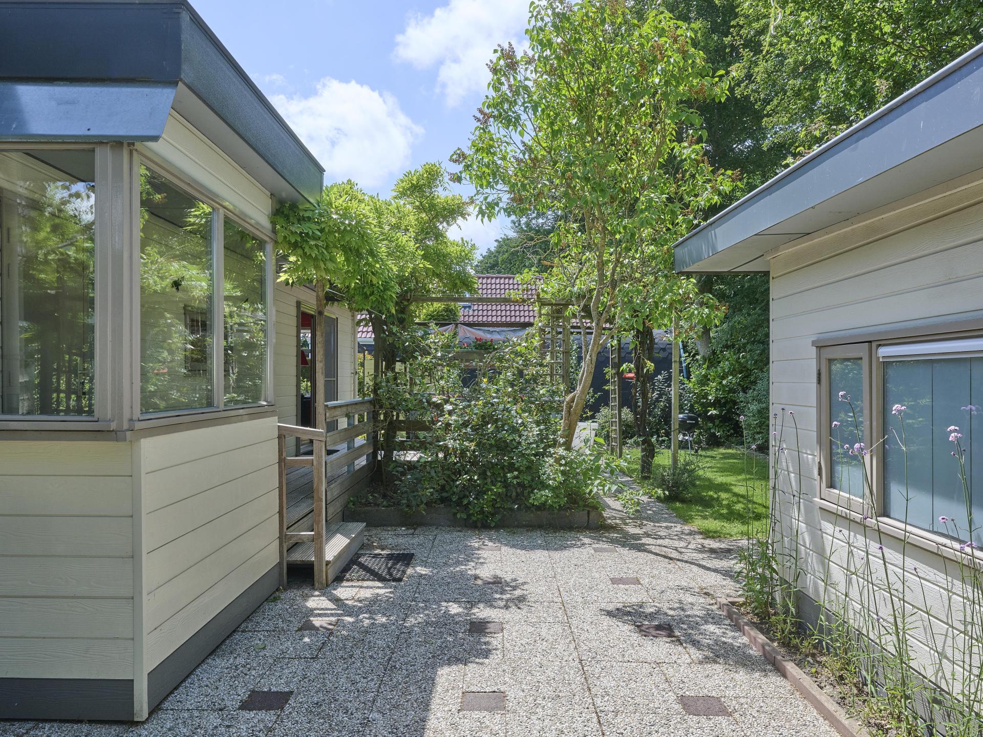 Knus chalet met grote tuin op kleinschalig park nabij strand Goedereede - foto 30