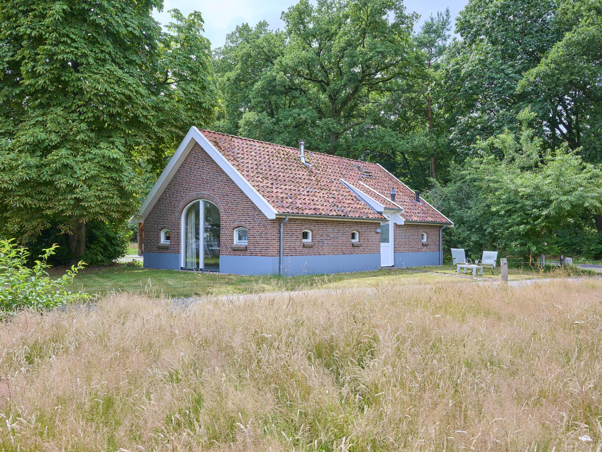 Design vakantiehuis met houtkachel op landgoed in bosrijk Twente - foto 26