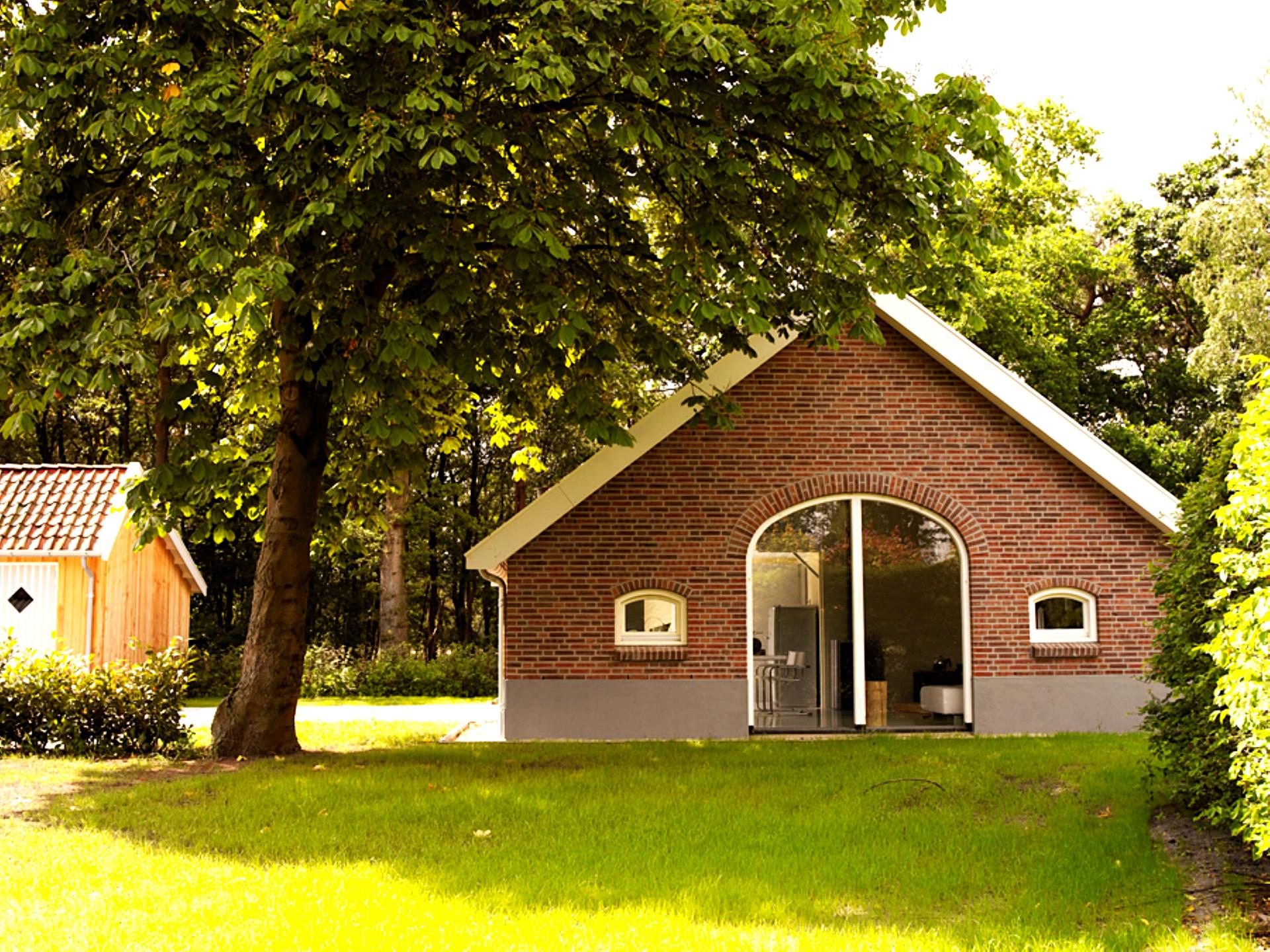 Design vakantiehuis met houtkachel op landgoed in bosrijk Twente - foto 31