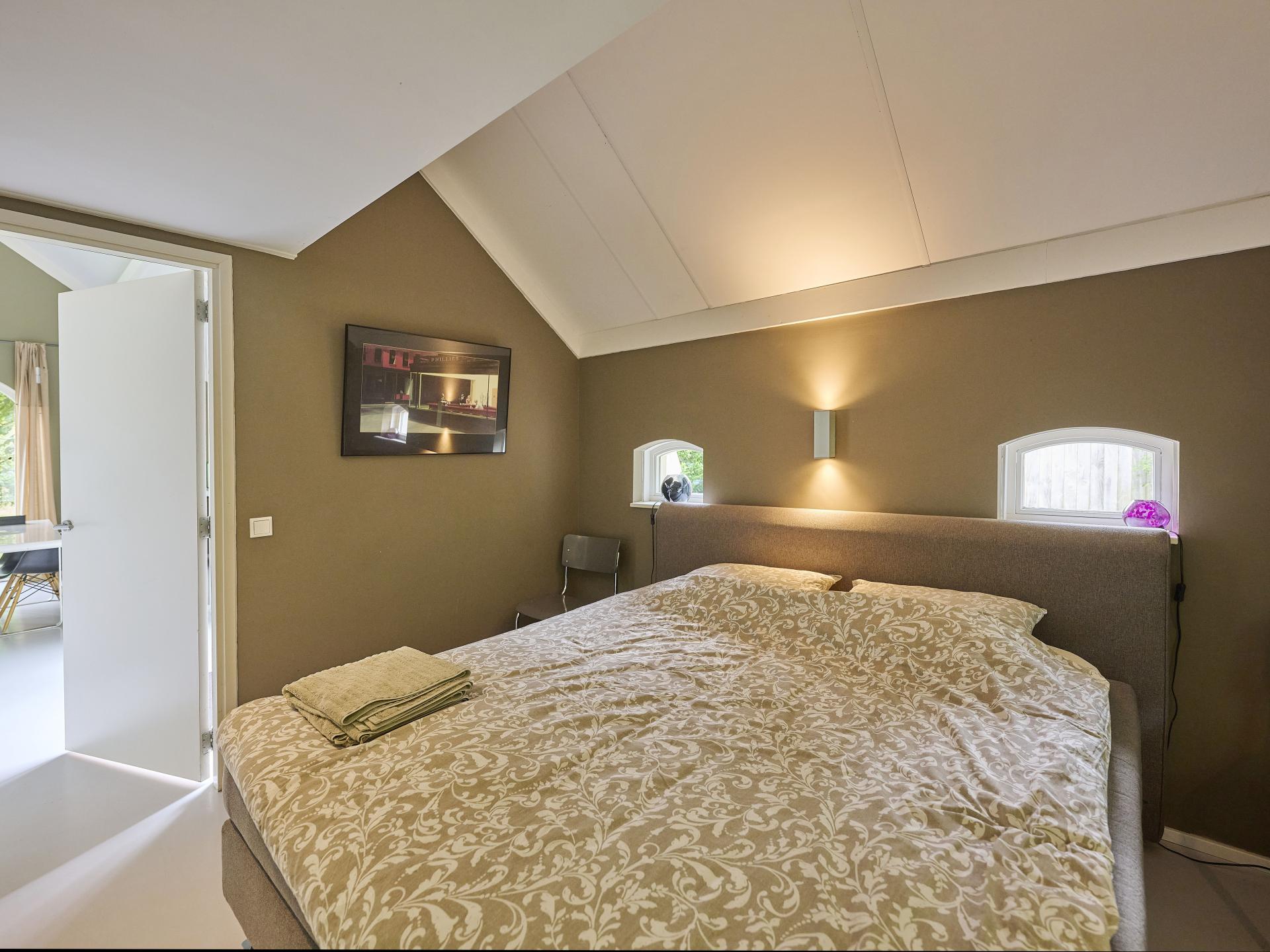 Design vakantiehuis met houtkachel op landgoed in bosrijk Twente - foto 15