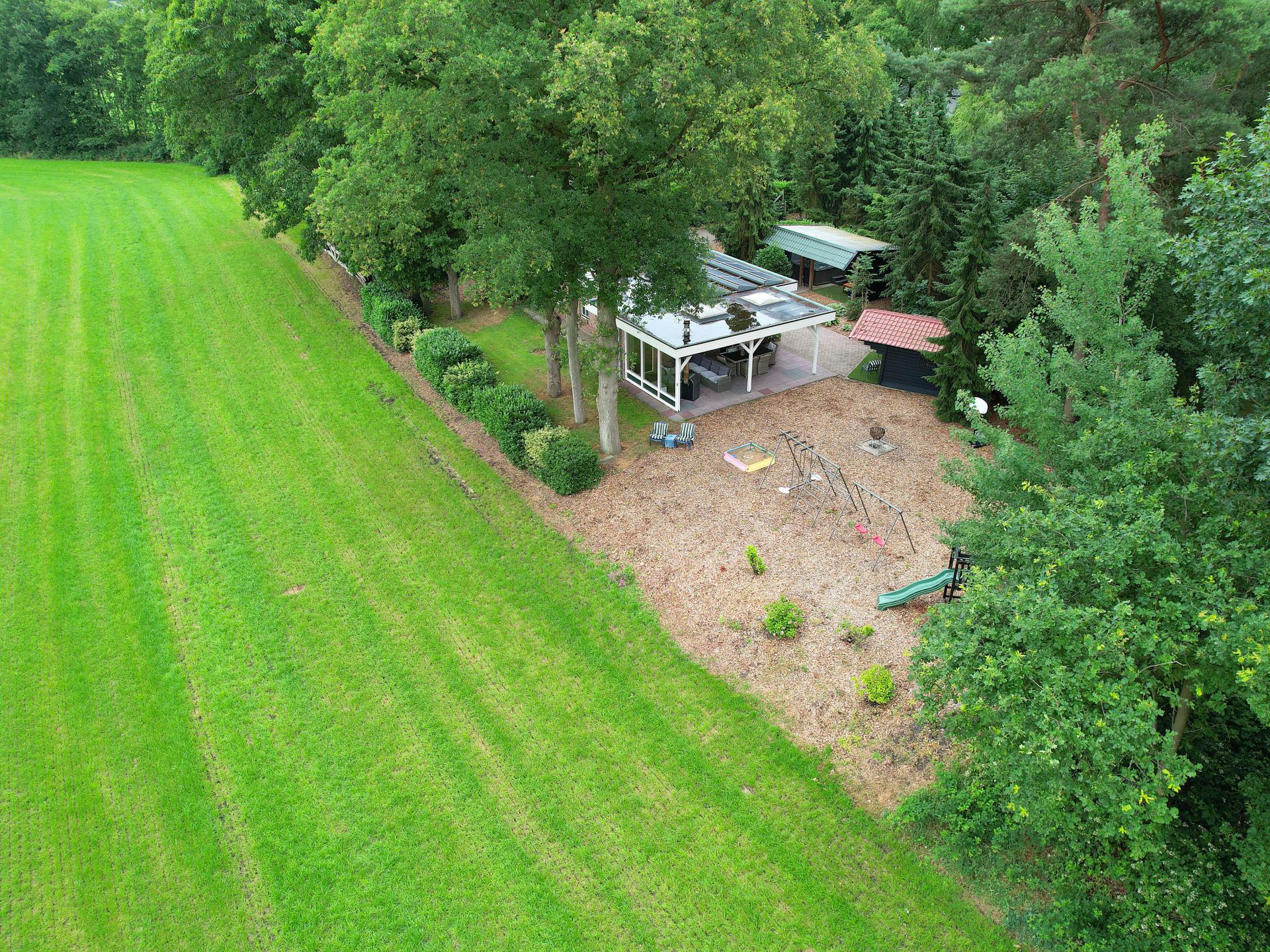 Vrijstaand vakantiehuis met bubbelbad en buitenhaard in Twente - foto 4