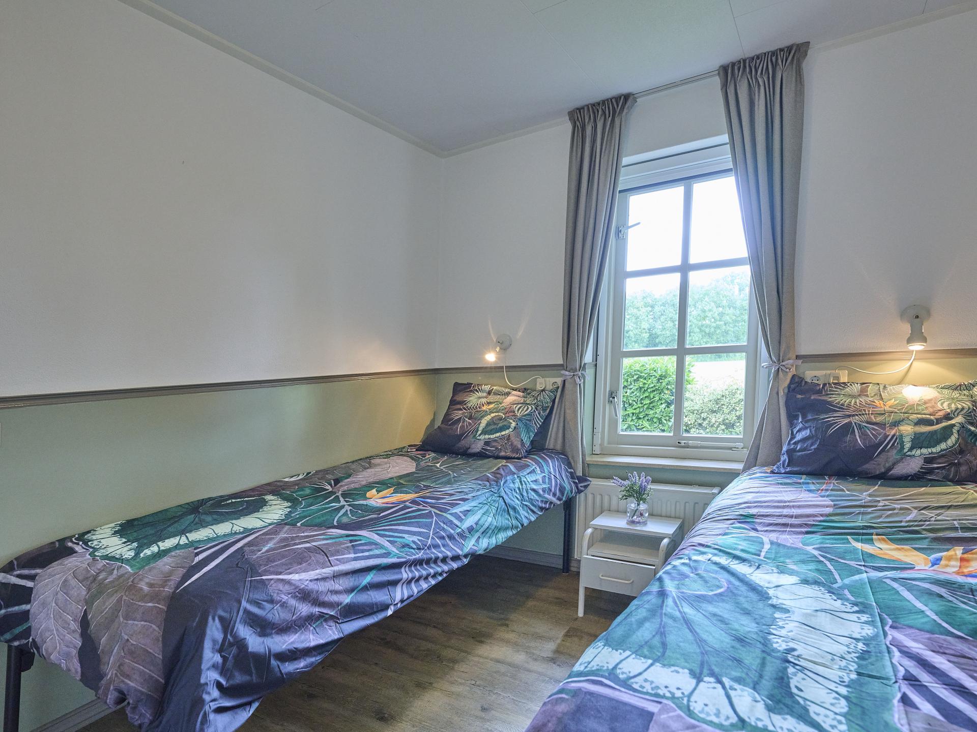 Vrijstaand vakantiehuis met bubbelbad en buitenhaard in Twente - foto 16