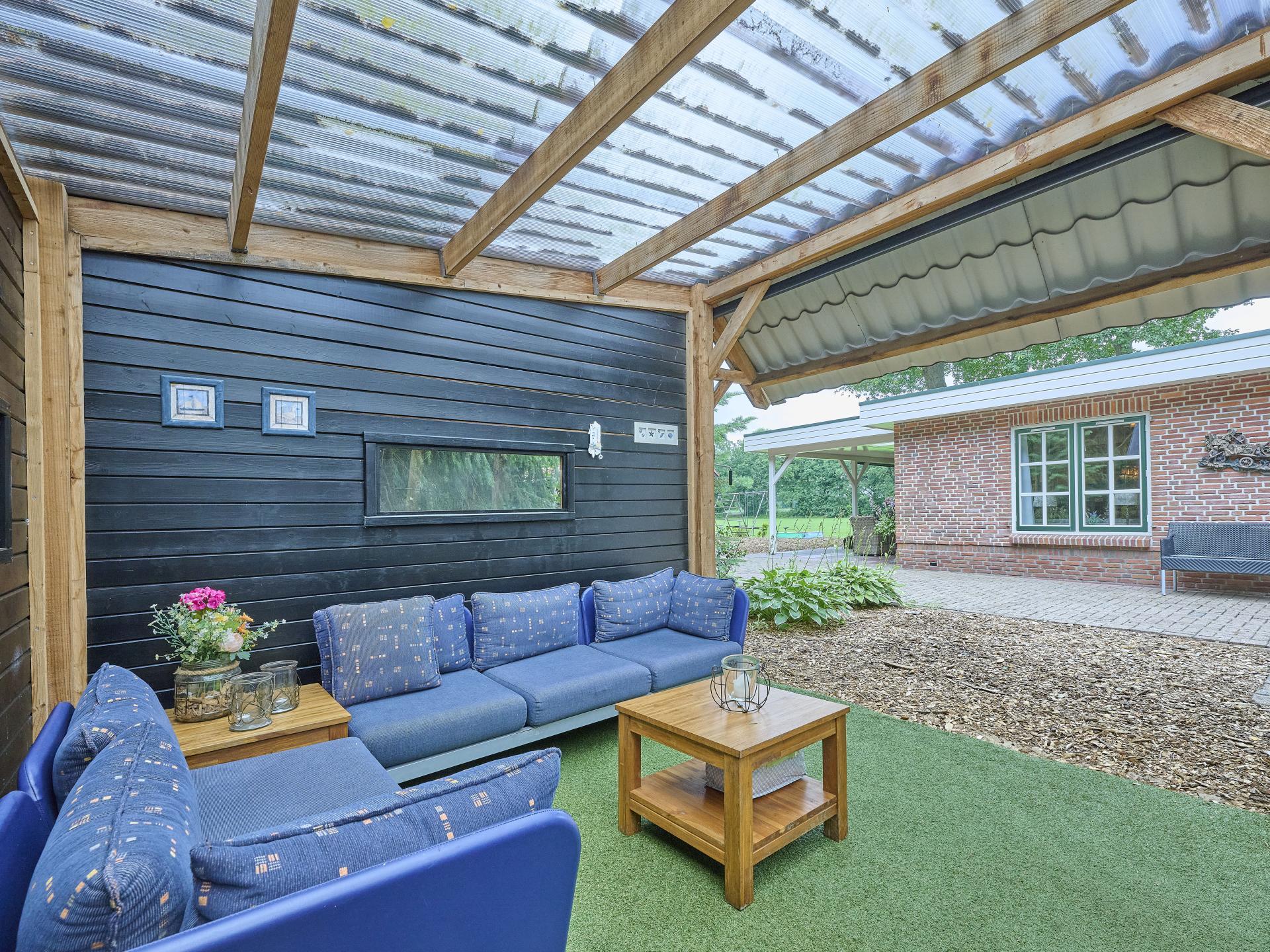 Vrijstaand vakantiehuis met bubbelbad en buitenhaard in Twente - foto 26