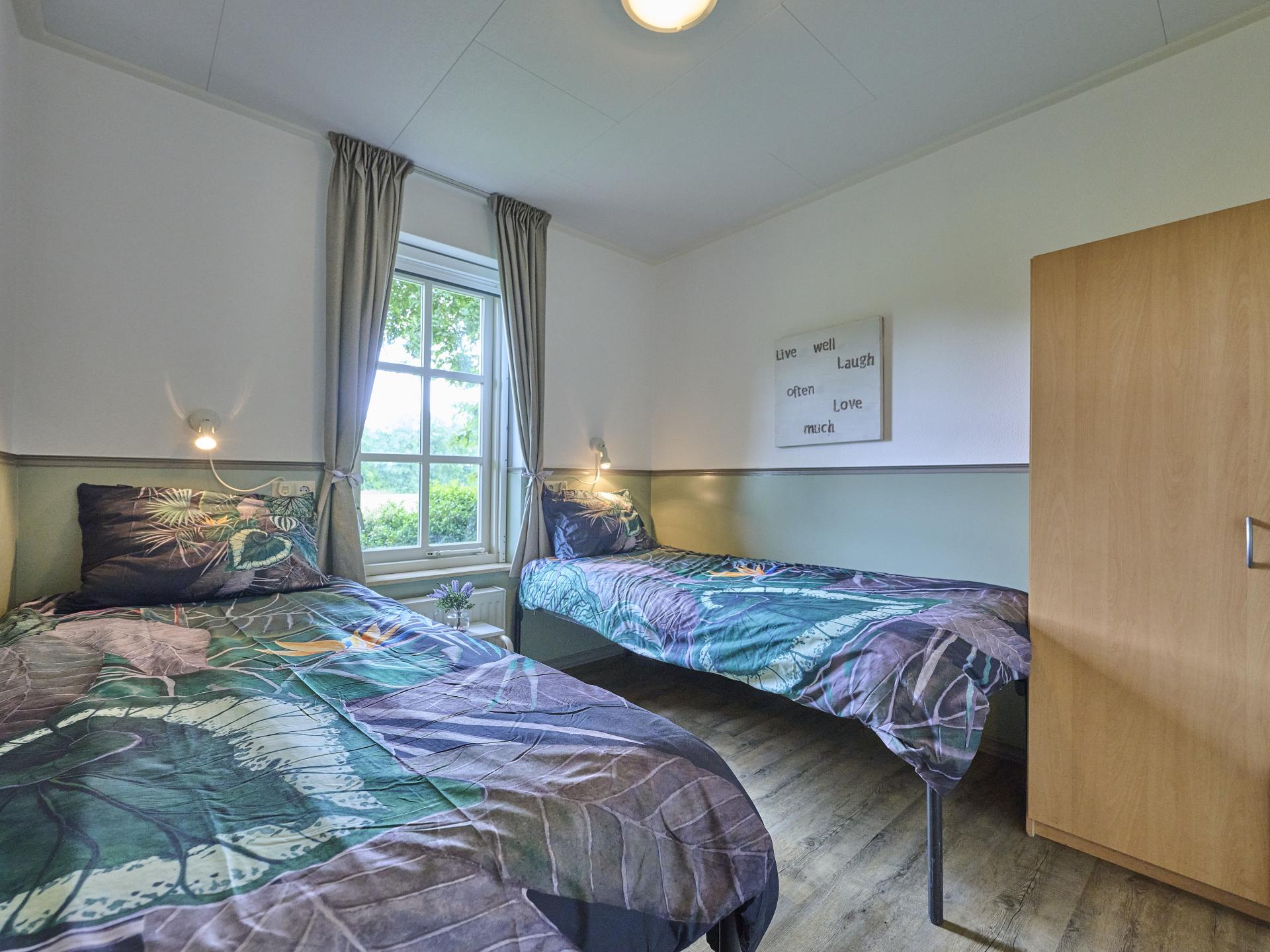 Vrijstaand vakantiehuis met bubbelbad en buitenhaard in Twente - foto 17