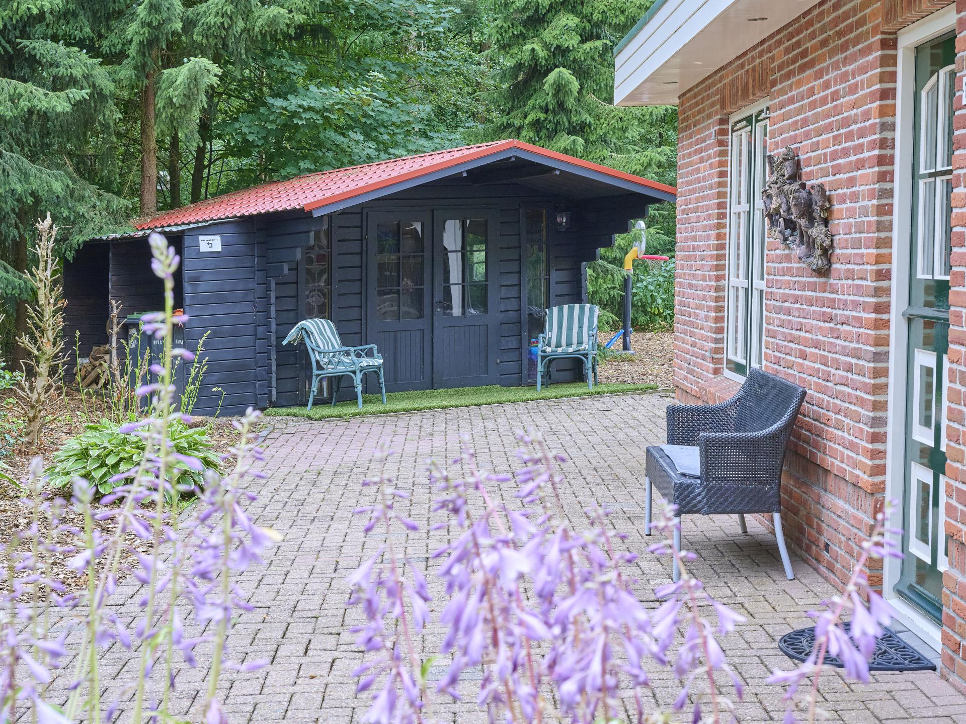 Vrijstaand vakantiehuis met bubbelbad en buitenhaard in Twente - foto 39