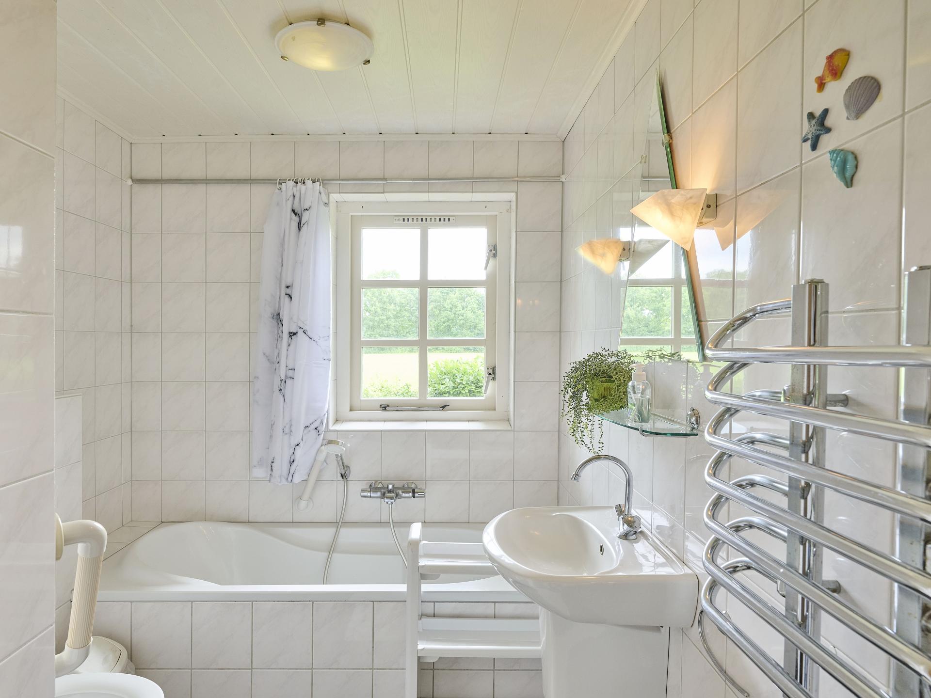 Vrijstaand vakantiehuis met bubbelbad en buitenhaard in Twente - foto 20
