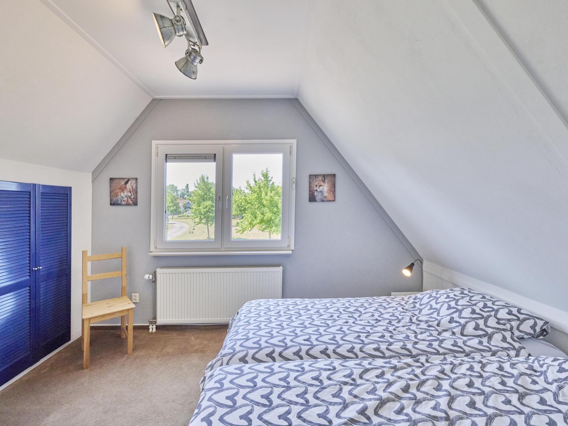 Sfeervol vrijstaand huis met veranda, 2 badkamers en uitzicht over de polder - foto 15