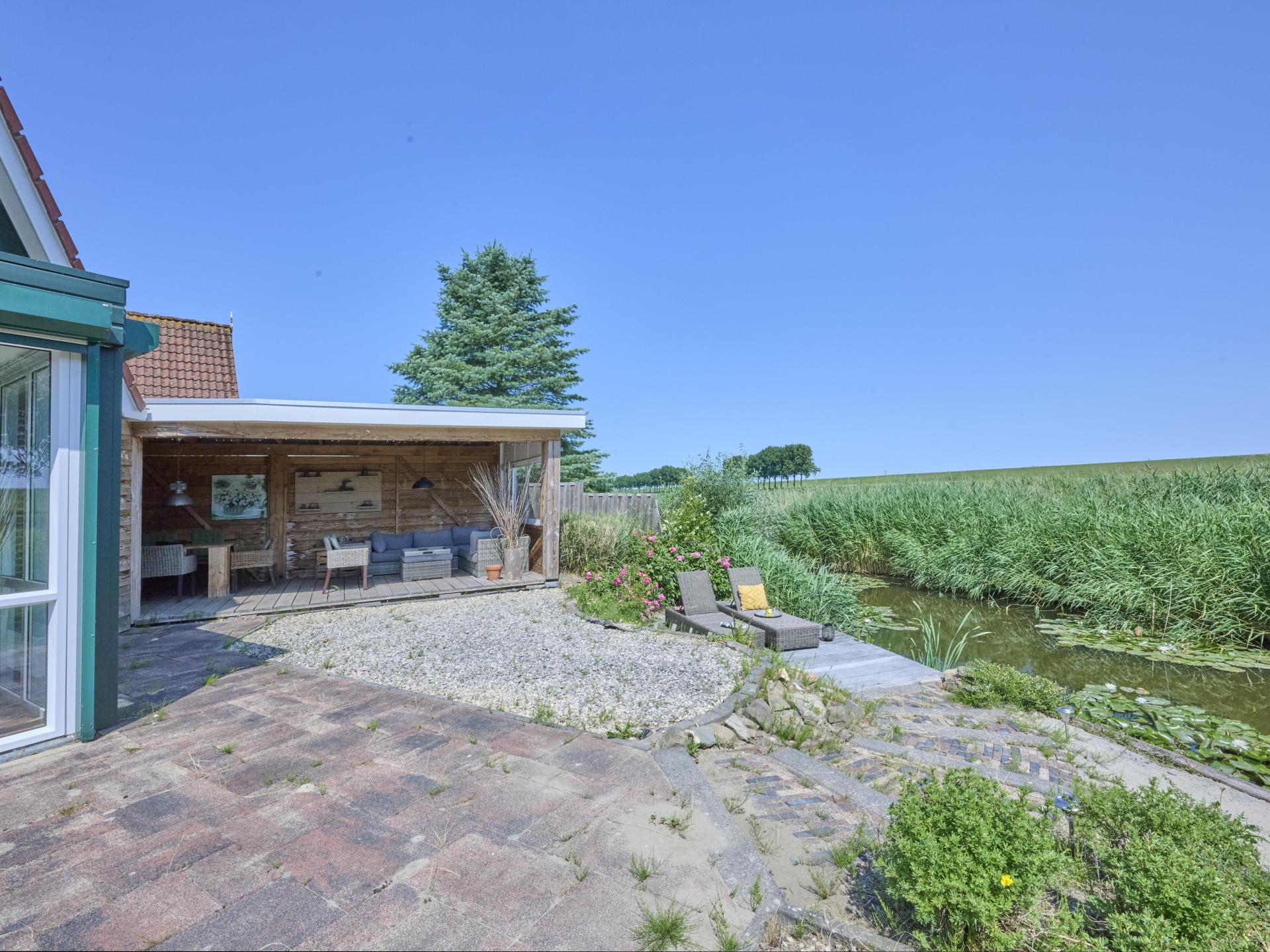 Sfeervol vrijstaand huis met veranda, 2 badkamers en uitzicht over de polder - foto 32