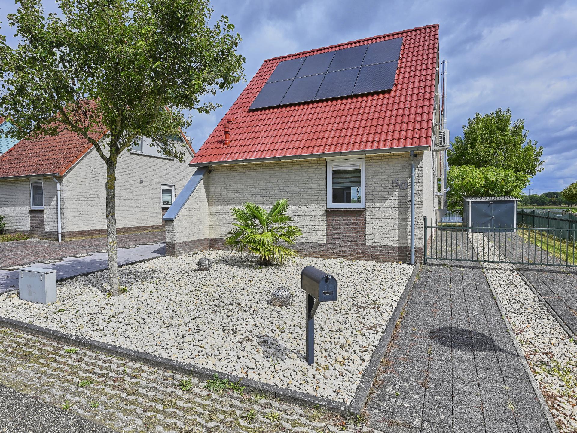 Vrijstaand vakantiehuis aan het water met grote tuin in Stevensweert - foto 27