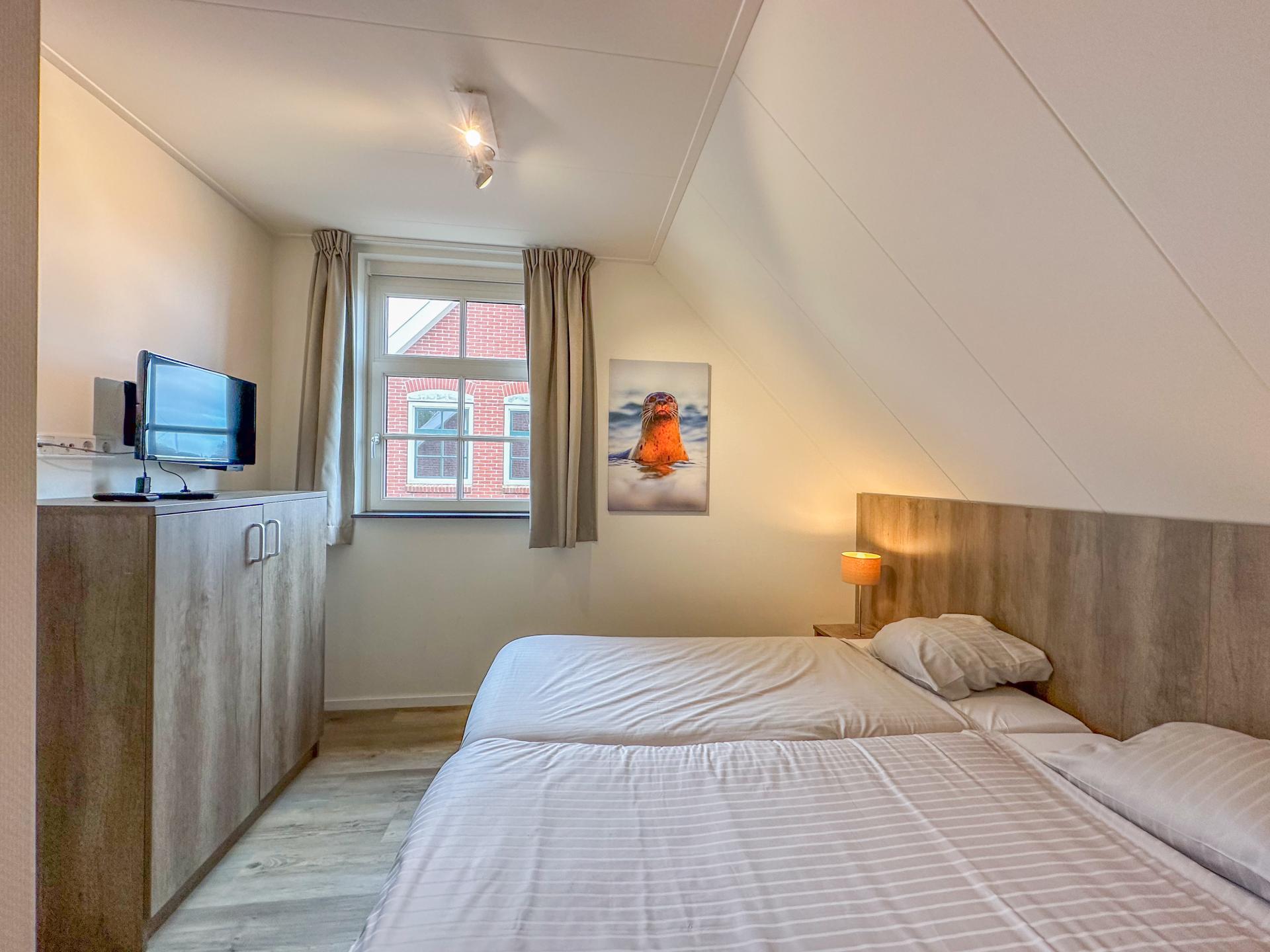 Luxe vrijstaande villa met sauna en tuin op 500m van het strand - foto 25
