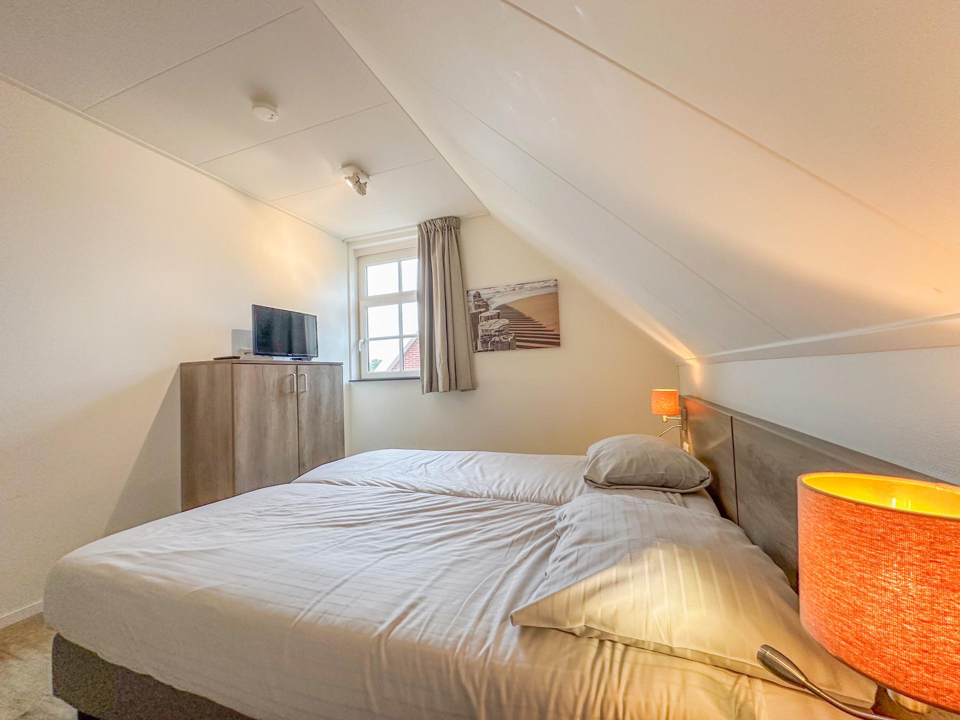 Luxe vrijstaande villa met sauna en tuin op 500m van het strand - foto 29