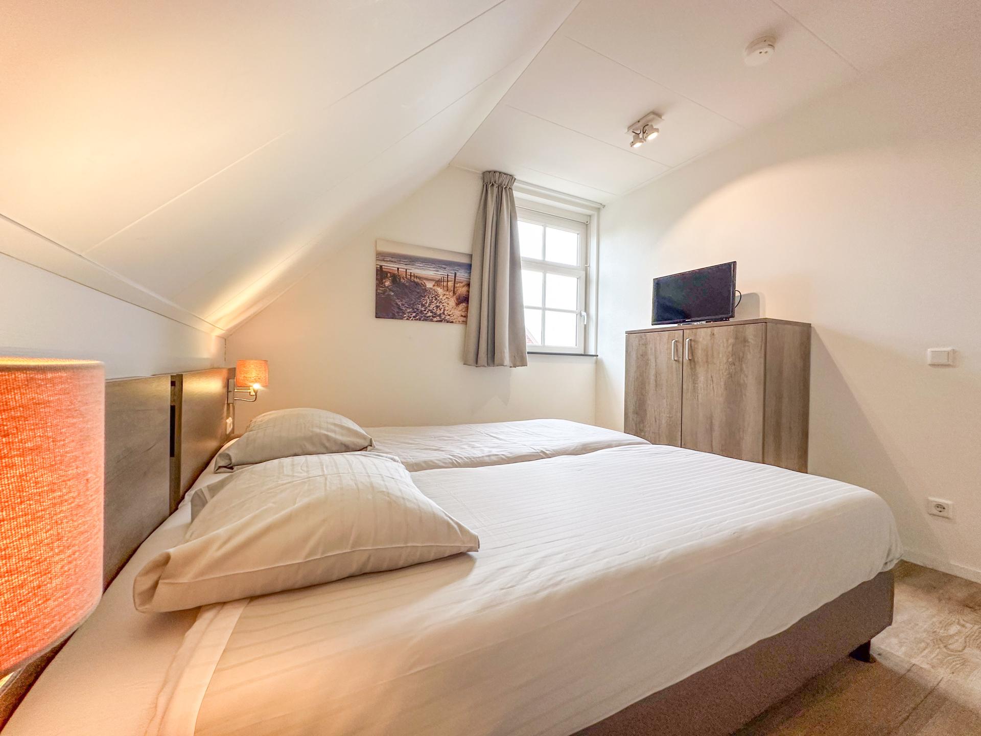 Luxe vrijstaande villa met sauna en tuin op 500m van het strand - foto 21