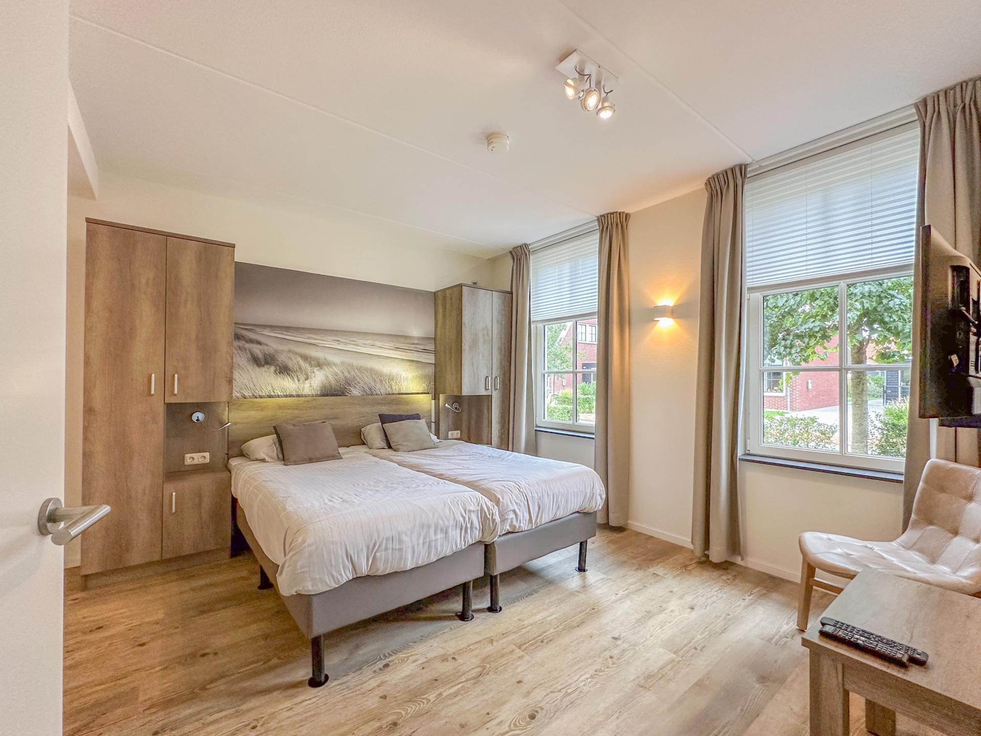 Luxe vrijstaande villa met sauna en tuin op 500m van het strand - foto 12