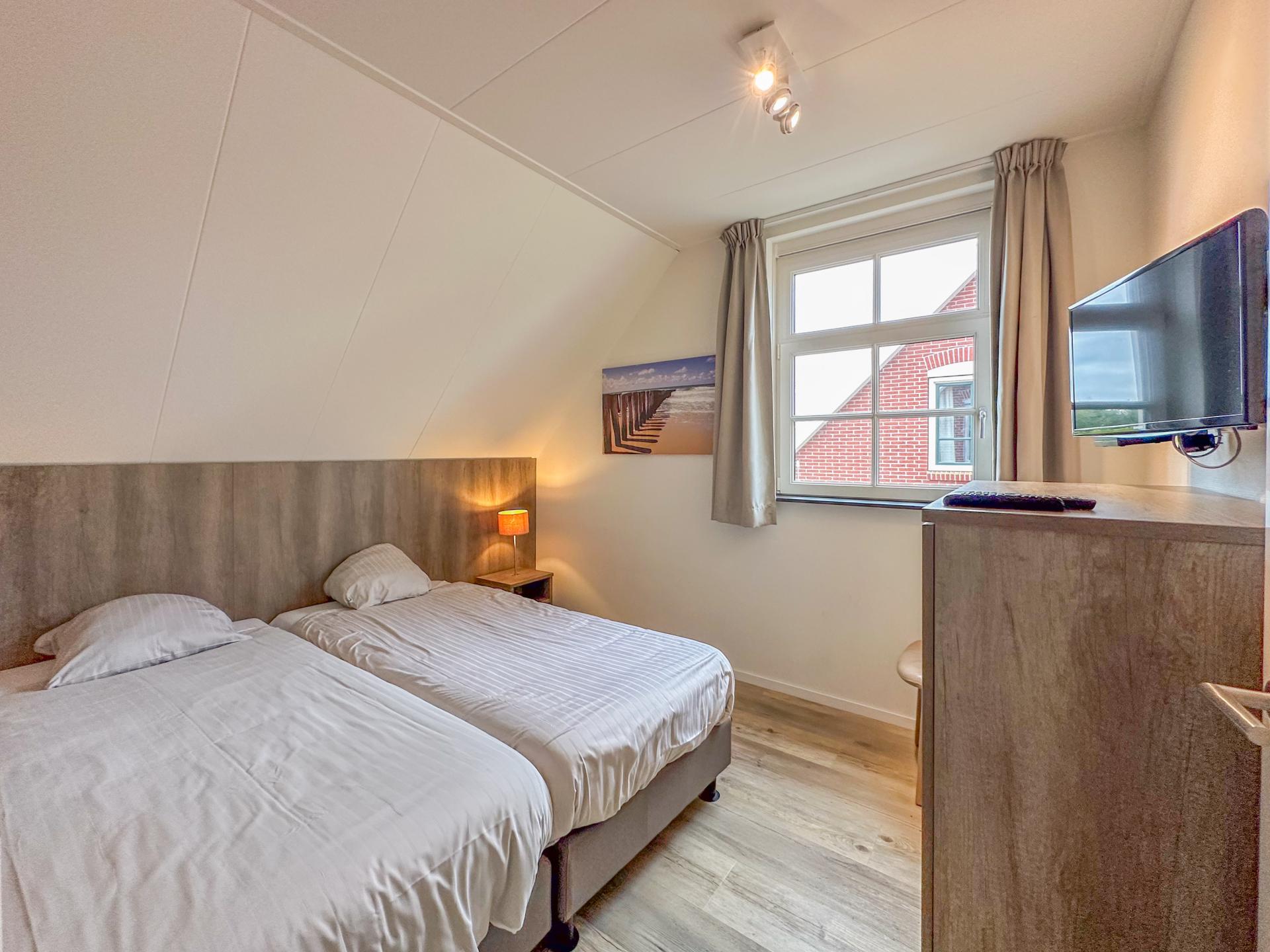 Luxe vrijstaande villa met sauna en tuin op 500m van het strand - foto 26