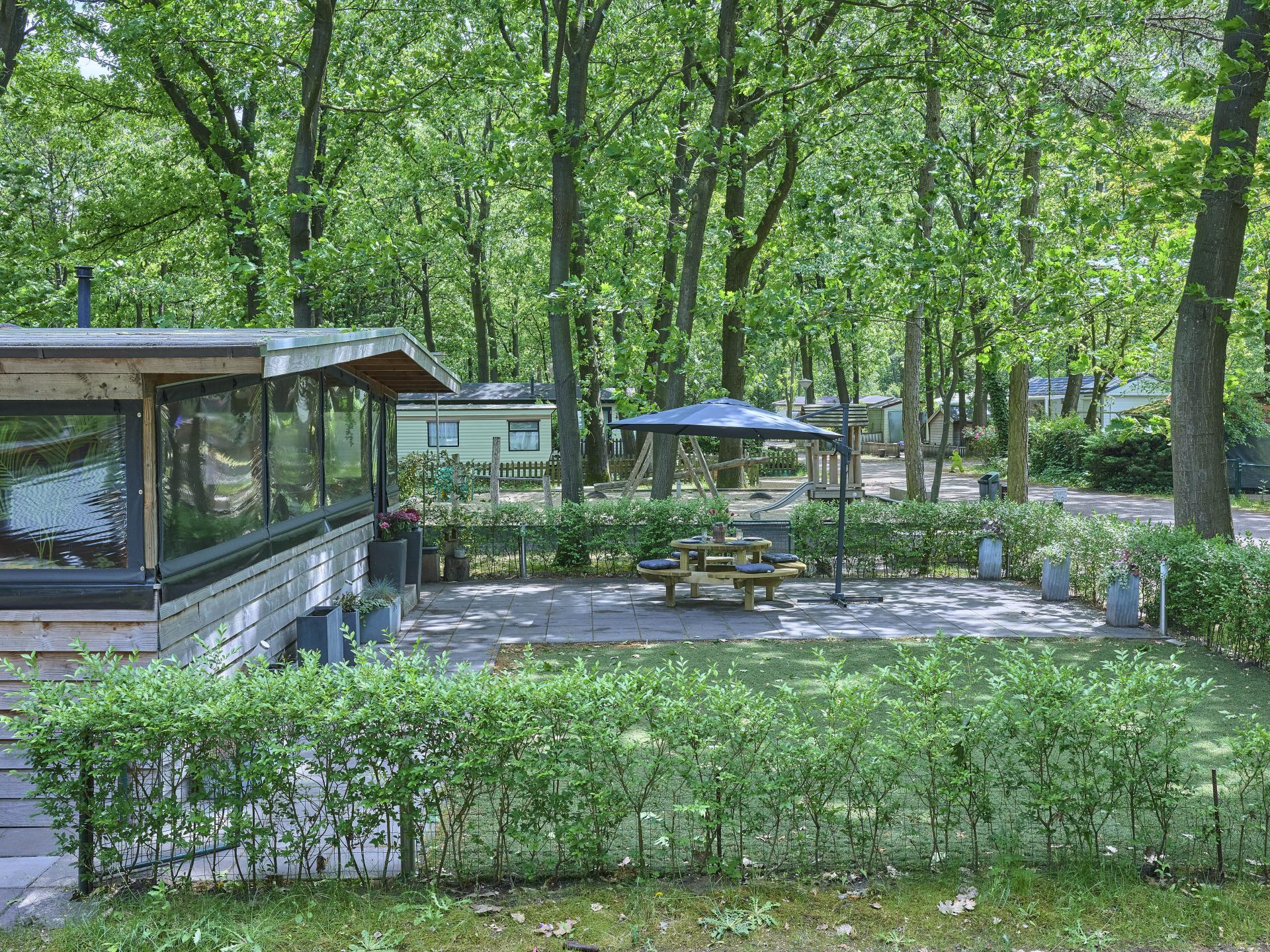 Natuurhuisje met serre en omheinde tuin op rustig park in Brabant - foto 19
