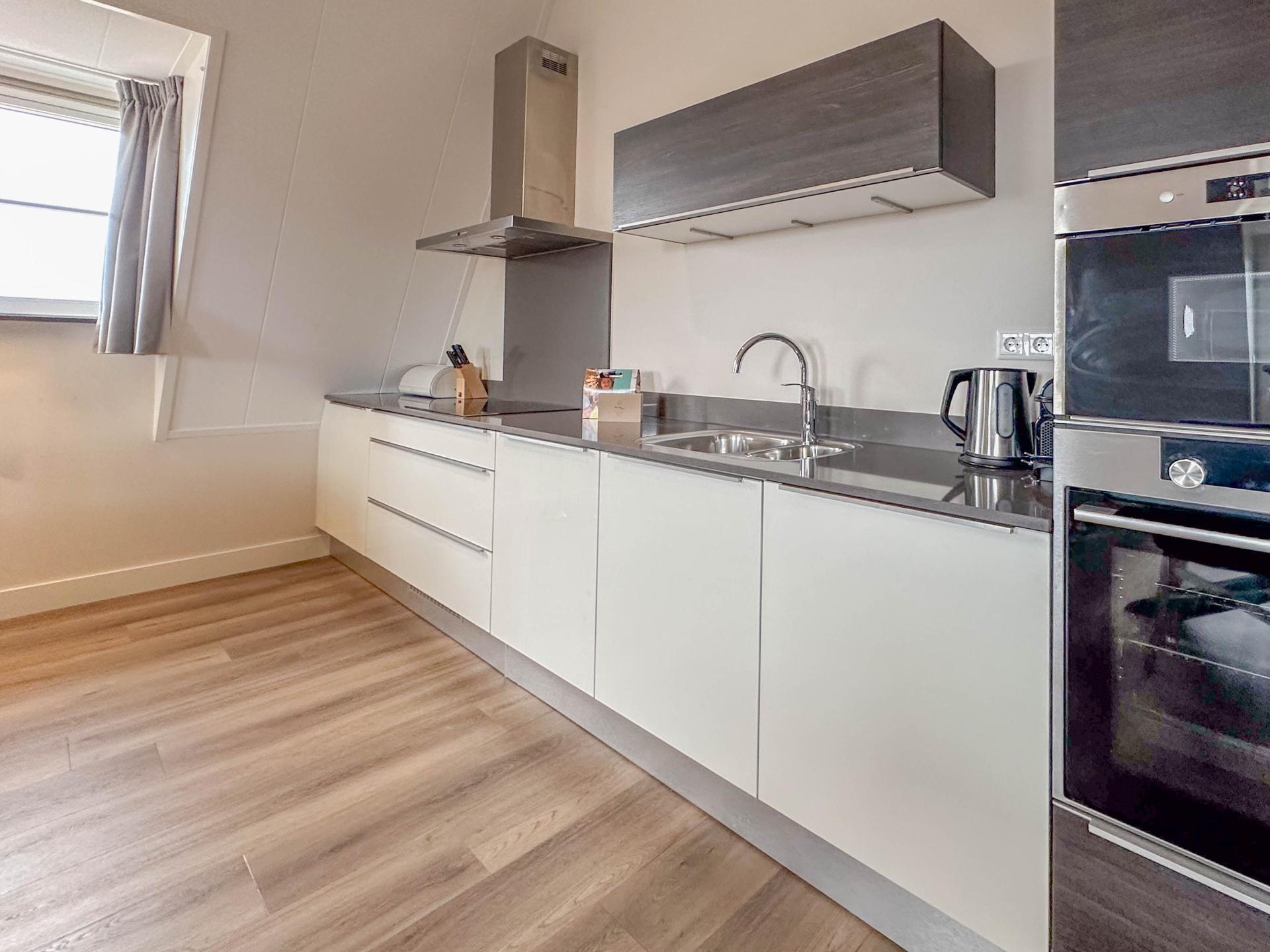 Luxe appartement met Finse sauna, spa-bad en zeezicht in Colijnsplaat - foto 9