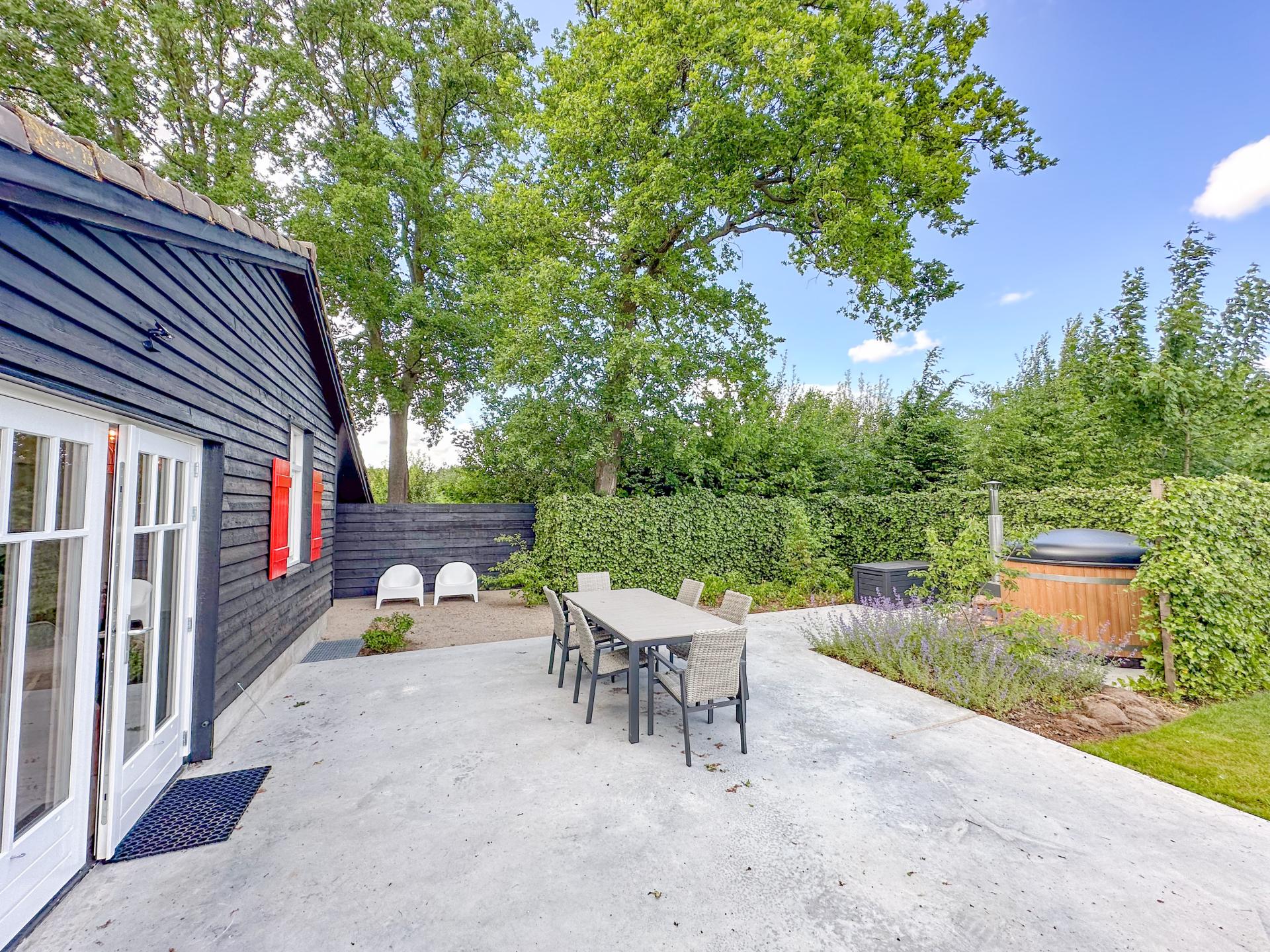 Luxe vrijstaand vakantiehuis met hottub in groene omgeving bij Breda - foto 22