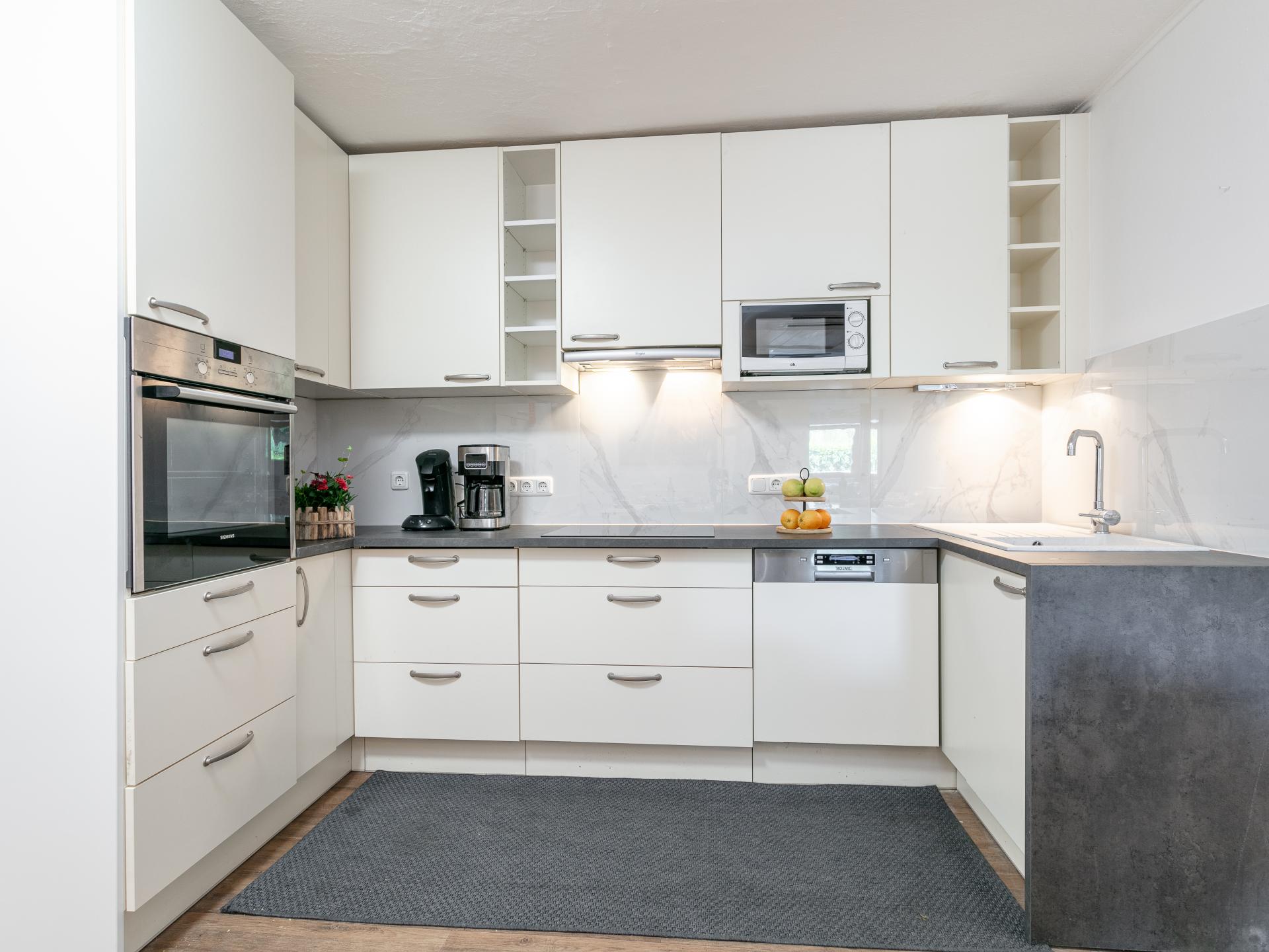 Ruim groepsappartement met tuin aan de piste in Kirchberg - foto 7
