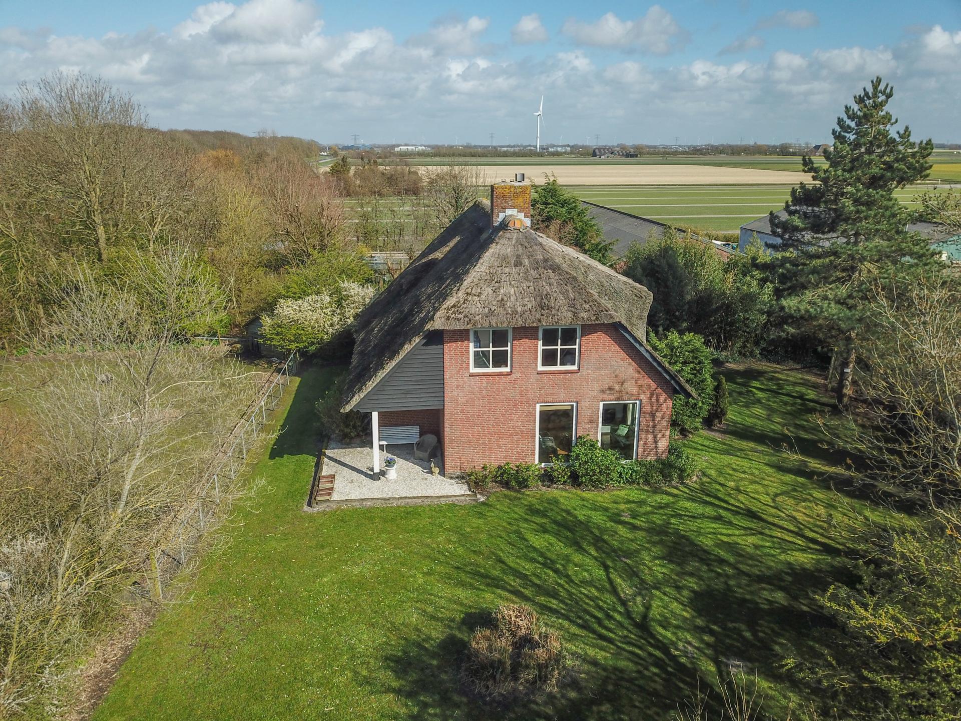 Landhuis met sauna en omheinde tuin bij strand van Callantsoog - foto 39