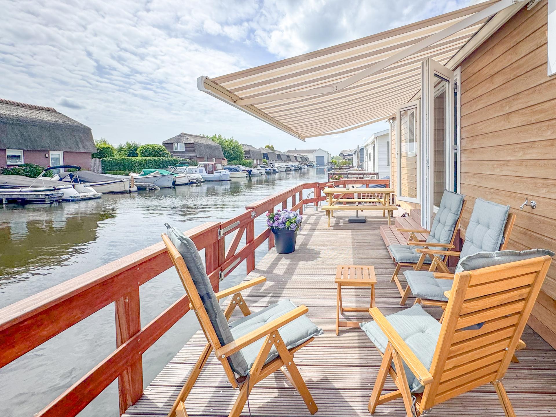 Chalet aan het water in Breukelen met airco en eigen terras - foto 22