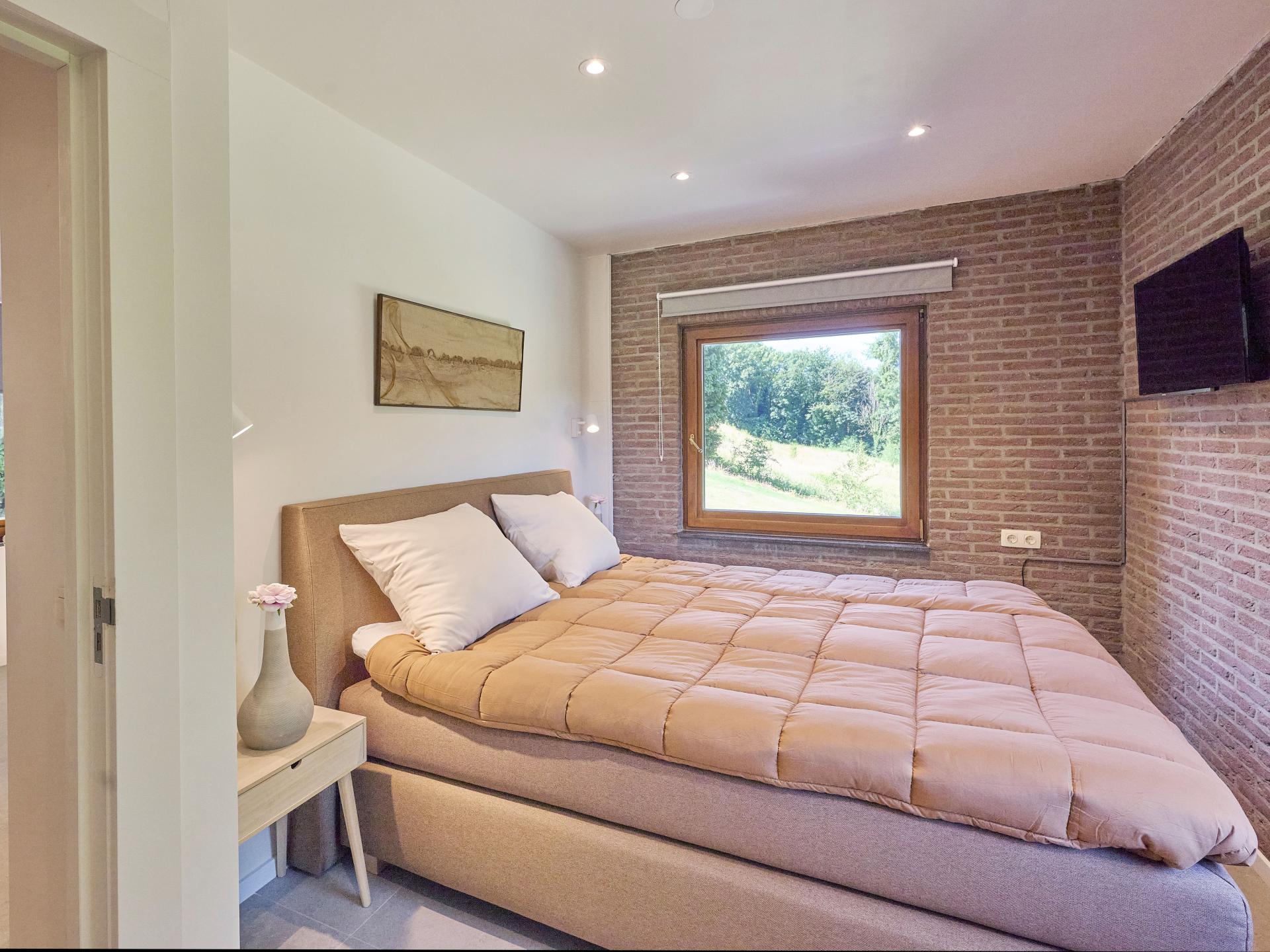 Luxe groepsvilla met privé wellness en grote tuin in hartje Limburg - foto 11