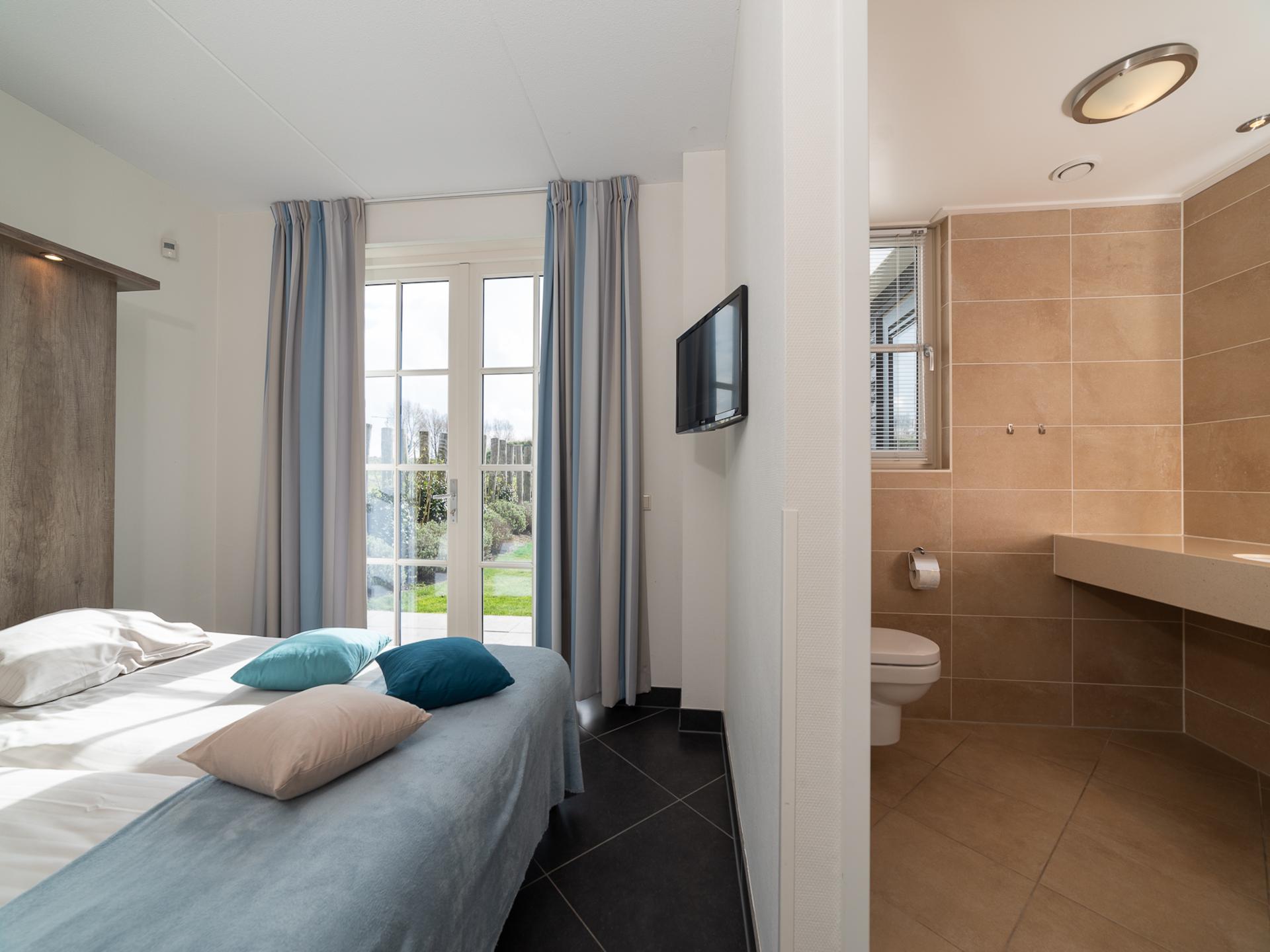 Luxe villa met privézwembad en sauna op 500m van het strand in Zeeland - foto 18