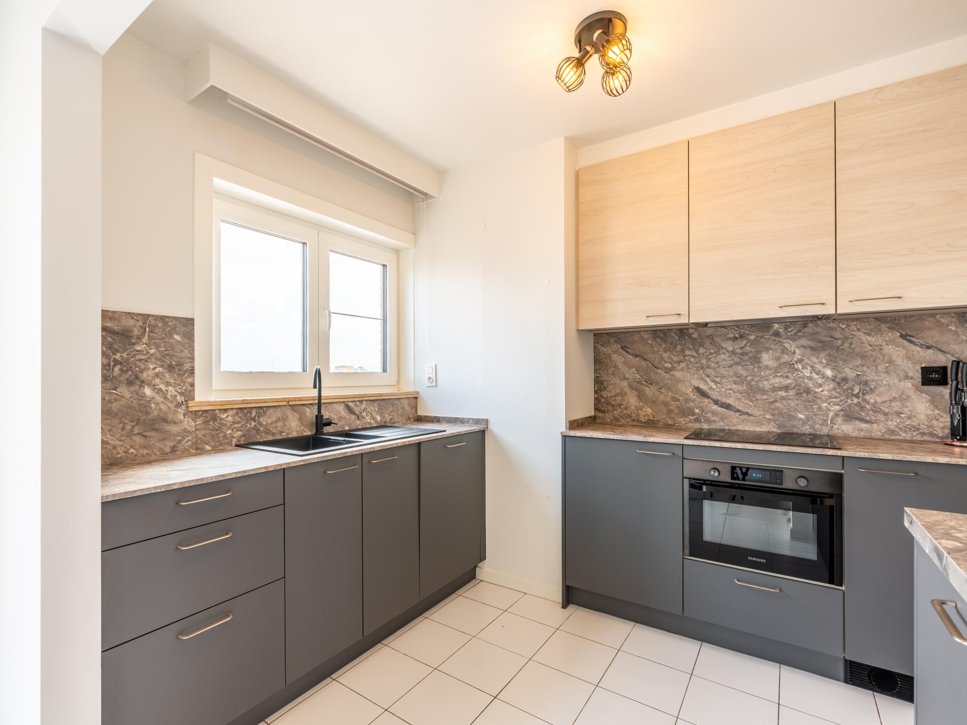 Centraal gelegen penthouse in Koksijde met dakterras en 3 slaapkamers - foto 4