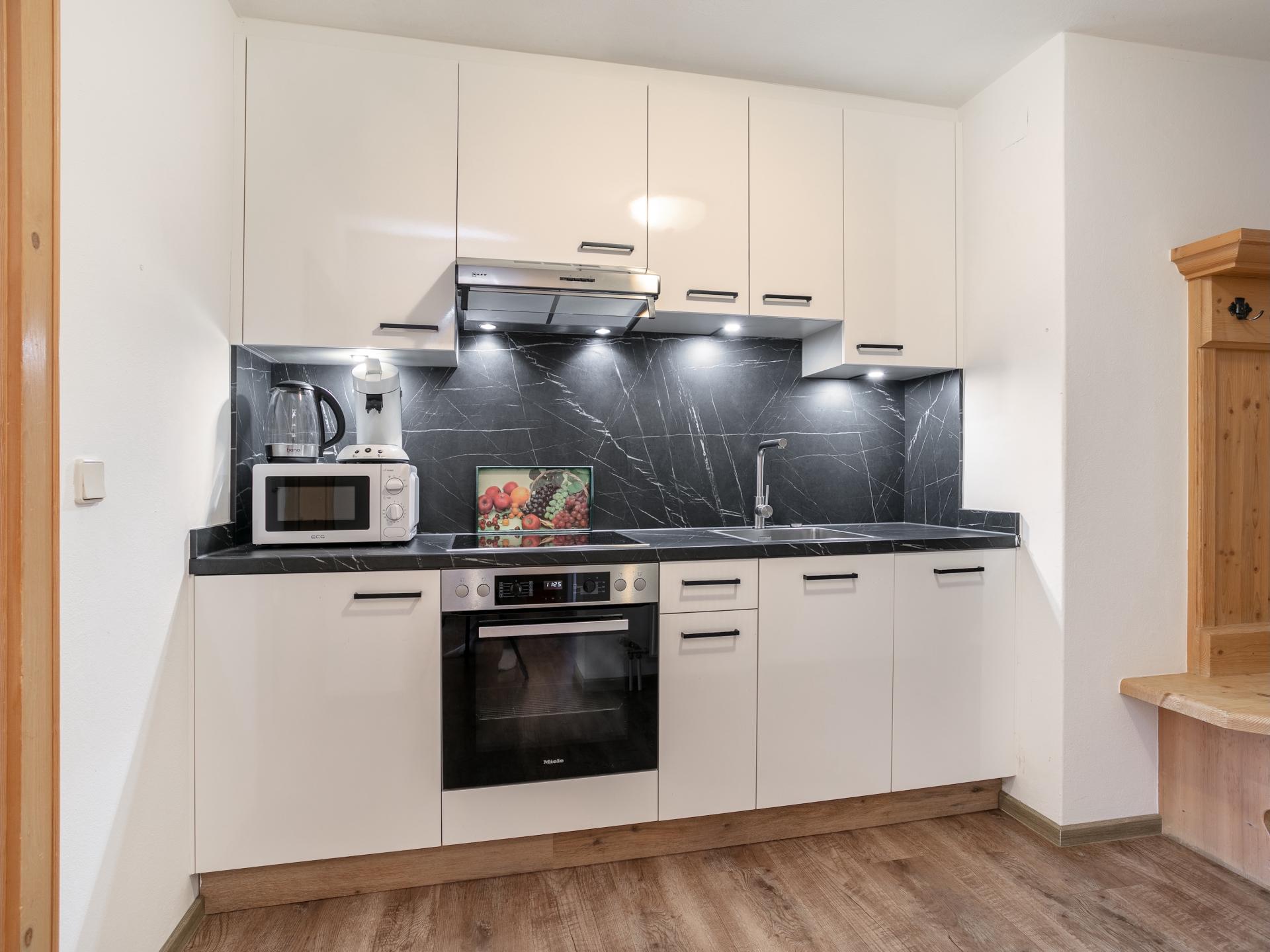 Ruim appartement voor 9 aan de bosrand met sauna, vlakbij de skilift - foto 22