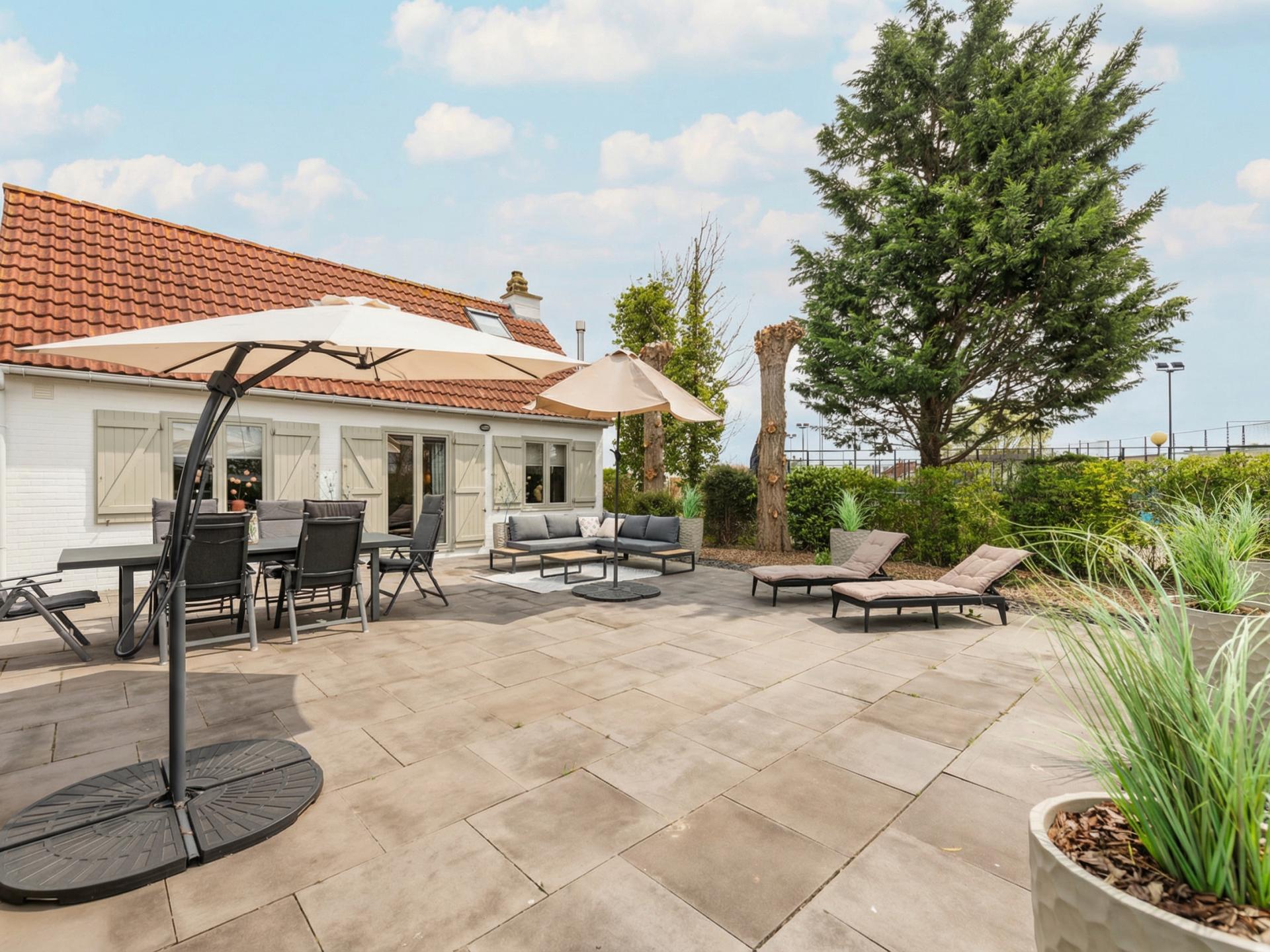Luxe vissershuis in De Haan met privé strandcabine en zonnige tuin - foto 19
