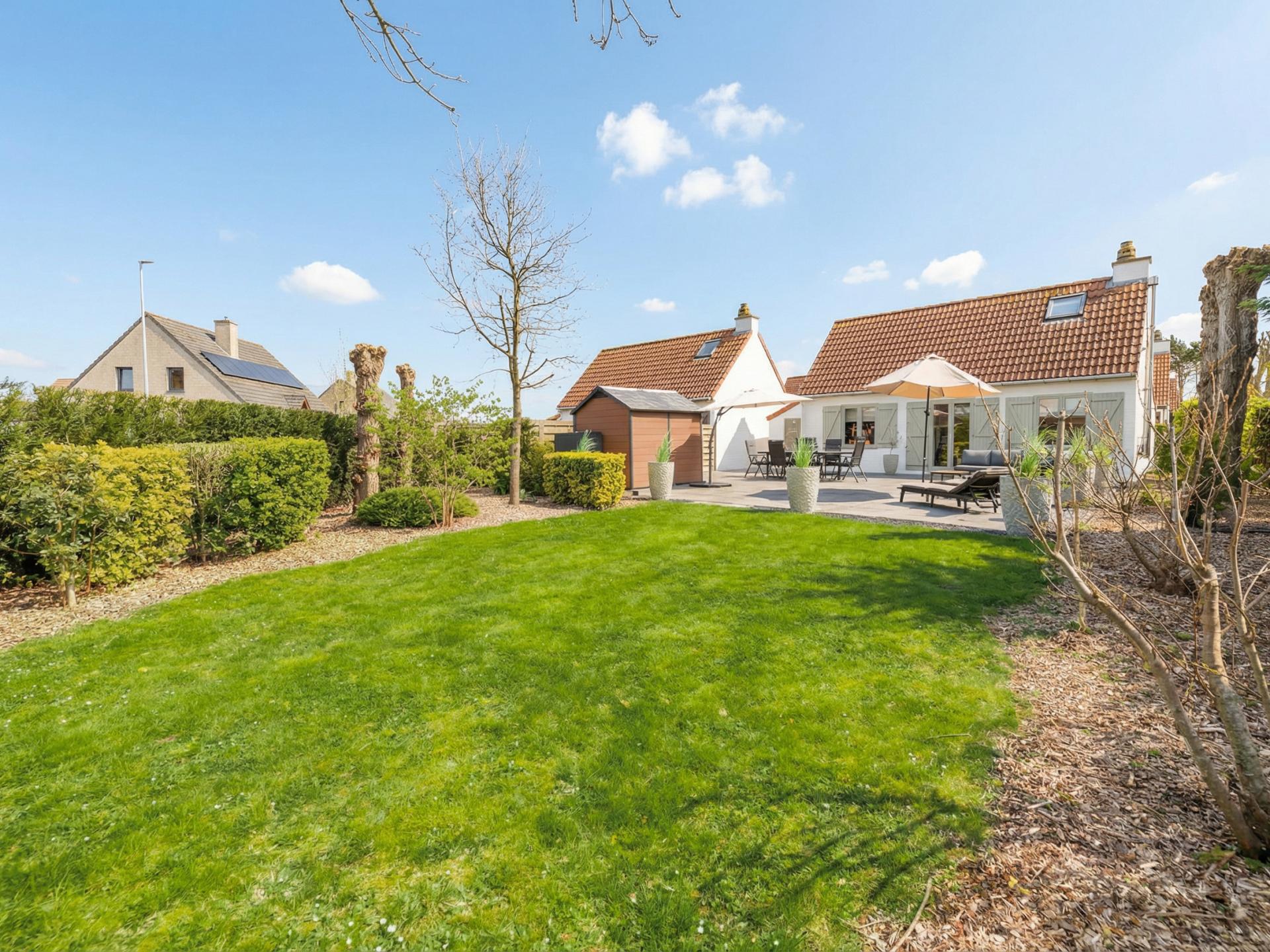 Luxe vissershuis in De Haan met privé strandcabine en zonnige tuin - foto 8