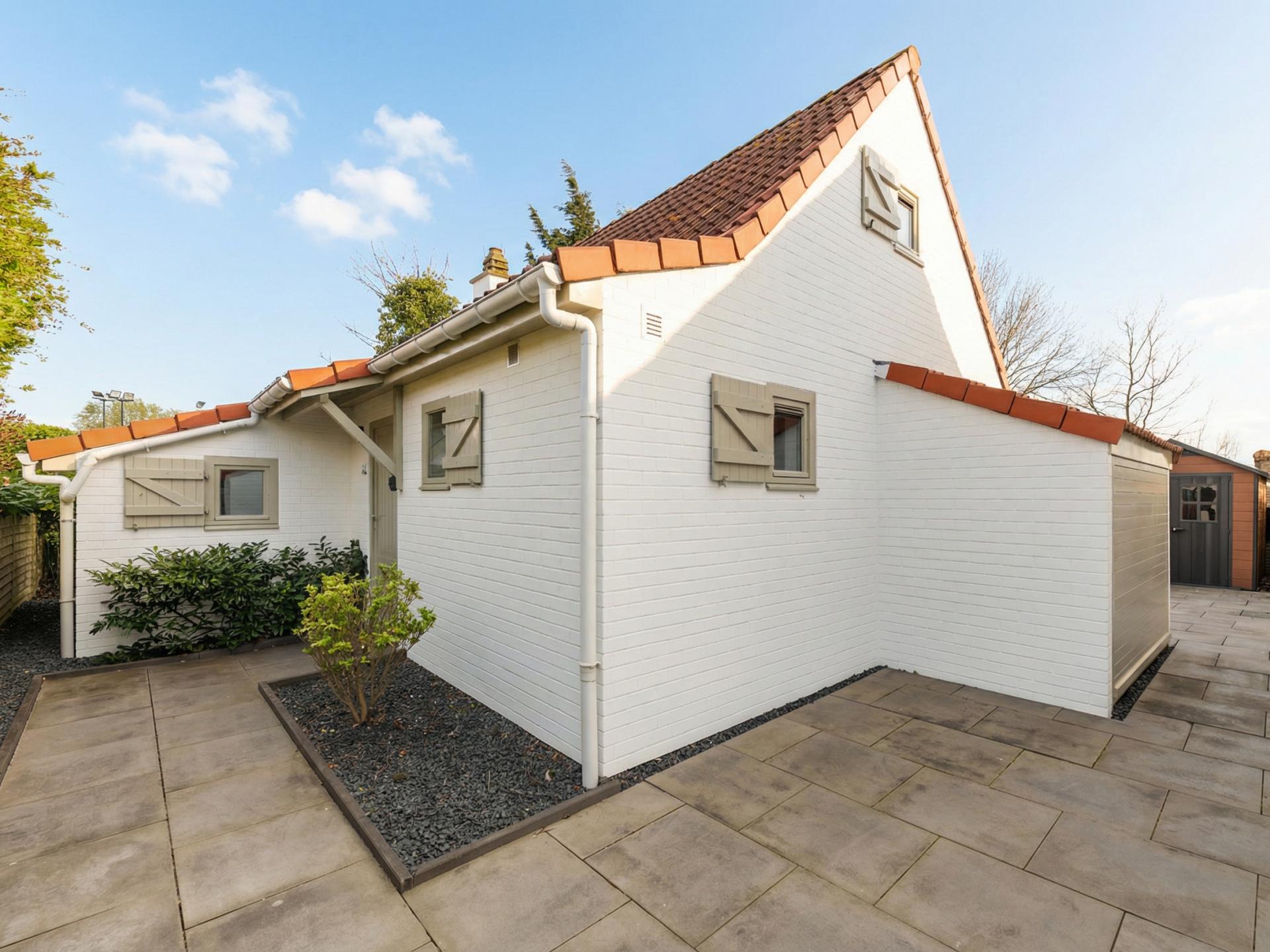 Luxe vissershuis in De Haan met privé strandcabine en zonnige tuin - foto 28