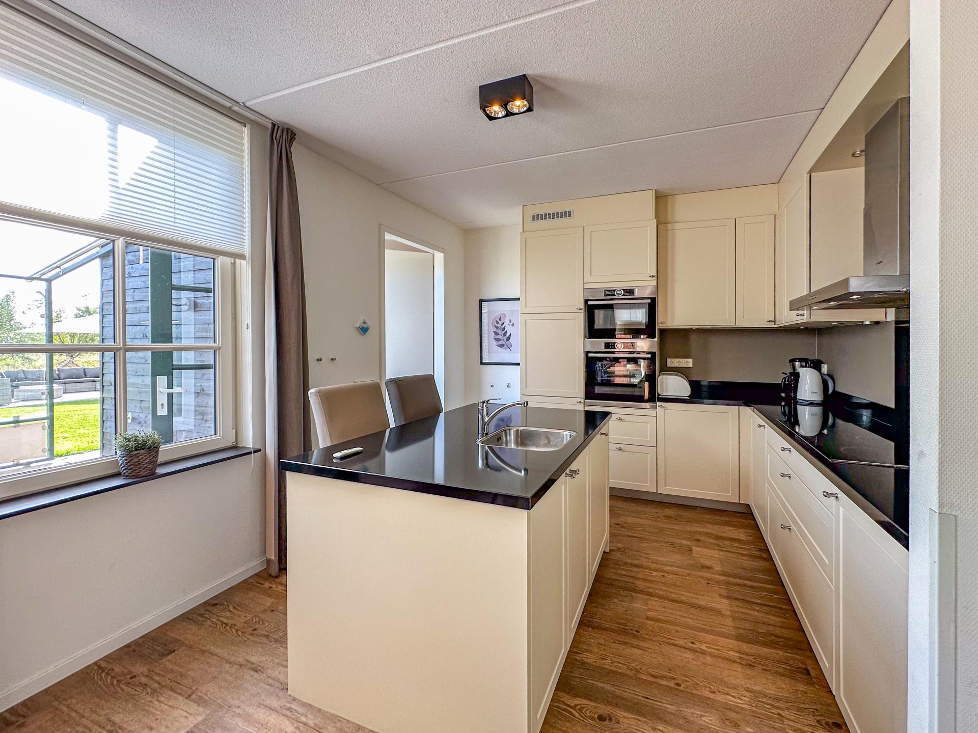 Luxe villa aan zee met sauna en Finse spa in Colijnsplaat - foto 11
