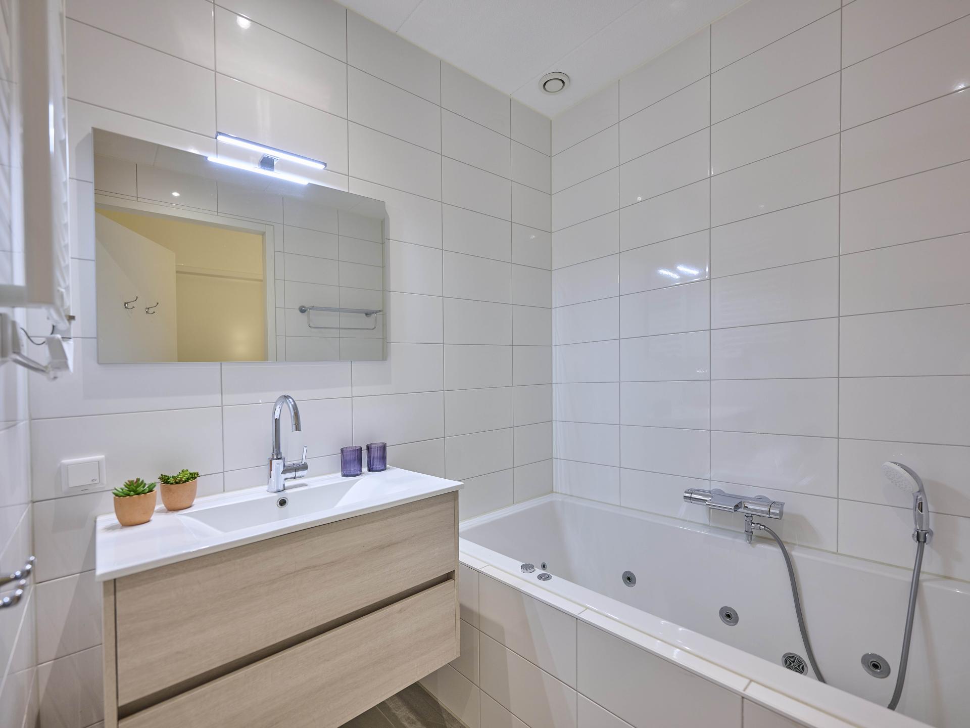 Luxe appartement met sauna en spa-bad op 14 meter van het Noordzeestrand - foto 17