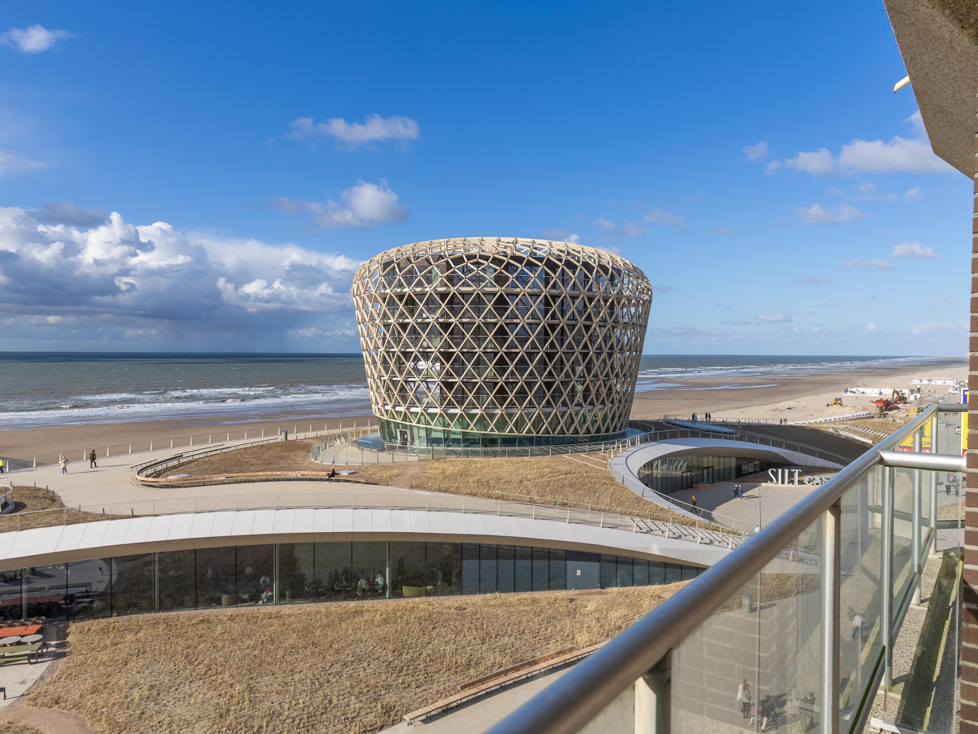 Zonovergoten appartement op de zeedijk met panoramisch zeezicht - foto 12