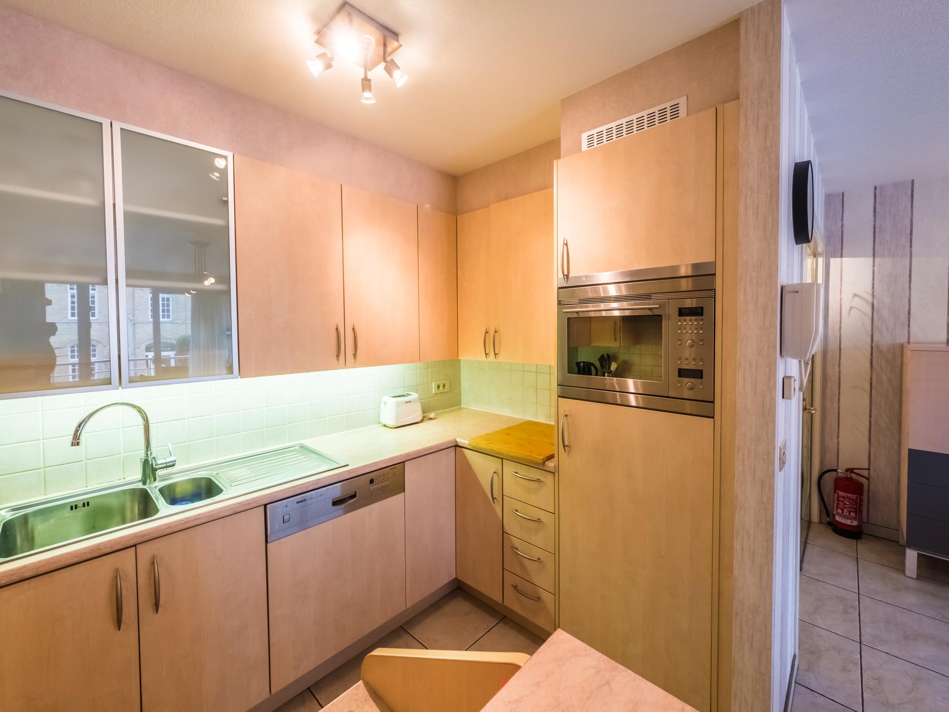 Zonnig appartement met 2 slaapkamers en terras, 22m van centrum - foto 8