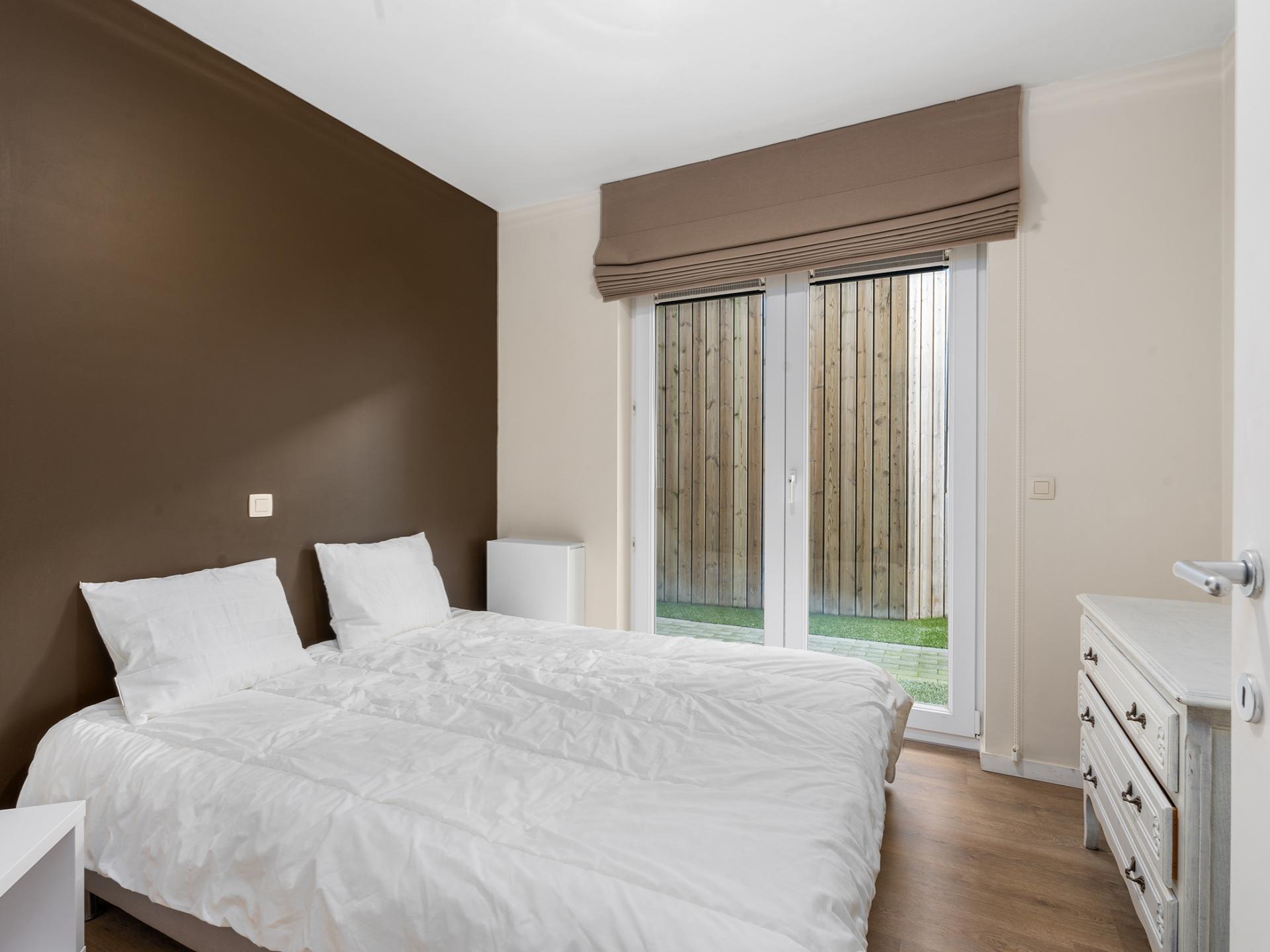 Licht appartement op de begane grond met tuintje, op 5 minuten van zee - foto 11