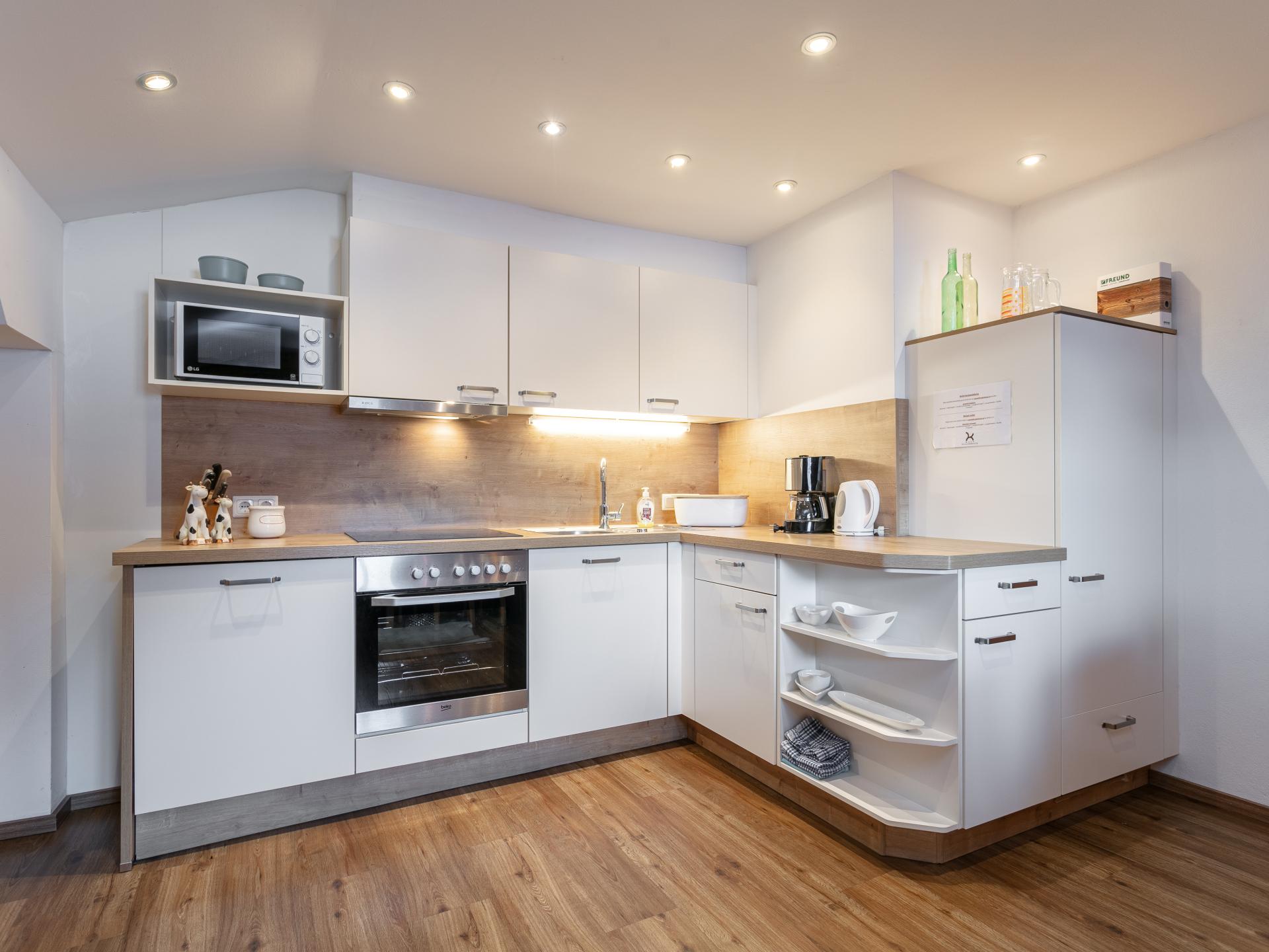 Rustiek appartement met wellness direct aan de skipiste in Leogang - foto 11
