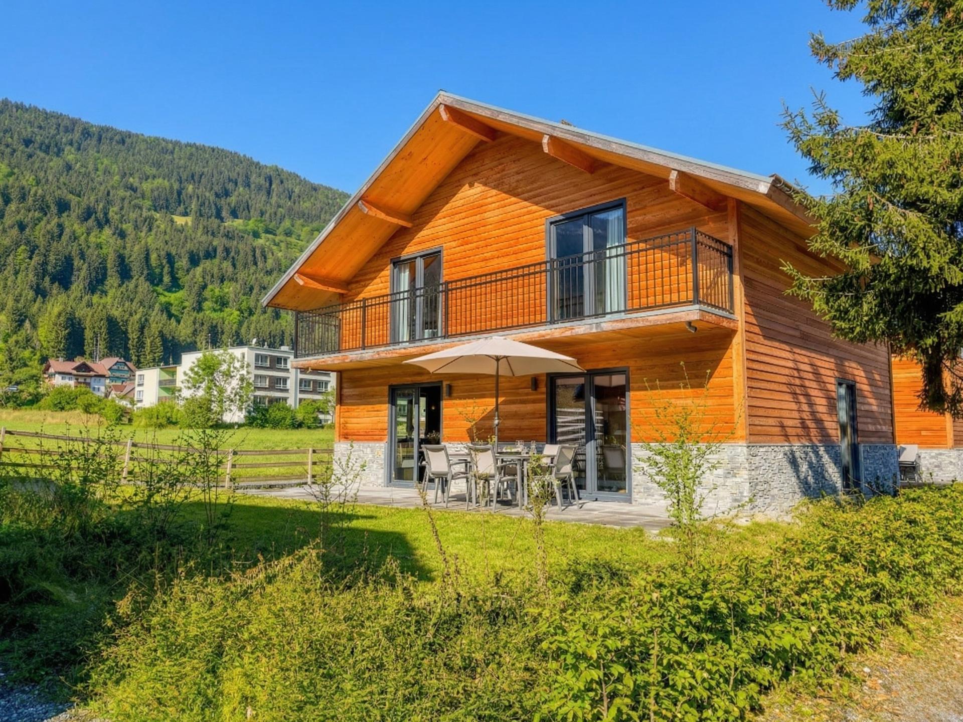 Chalet aan de Afritzer See met privé sauna en uitzicht op de Alpen - foto 1