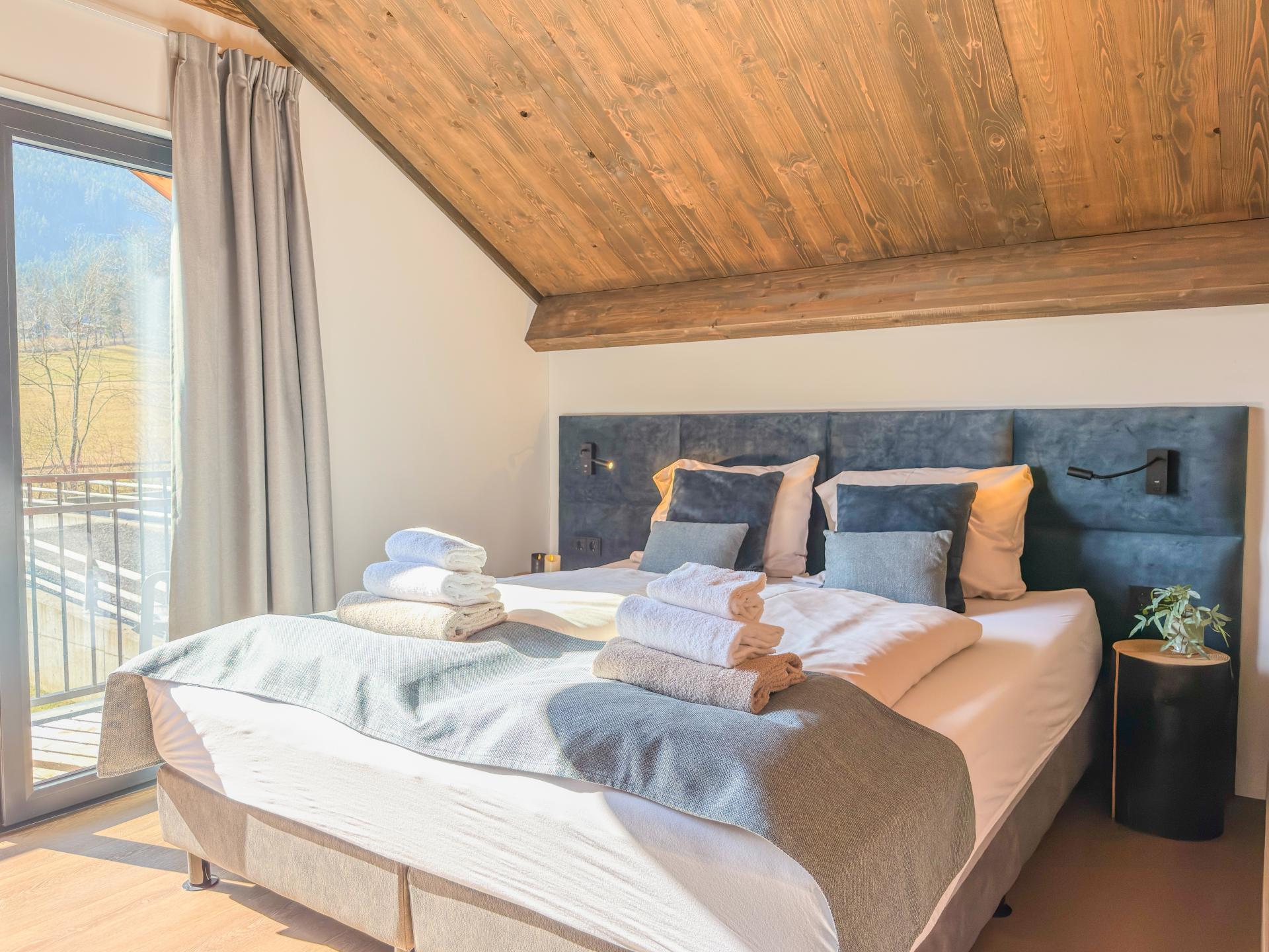 Chalet aan de Afritzer See met privé sauna en uitzicht op de Alpen - foto 8
