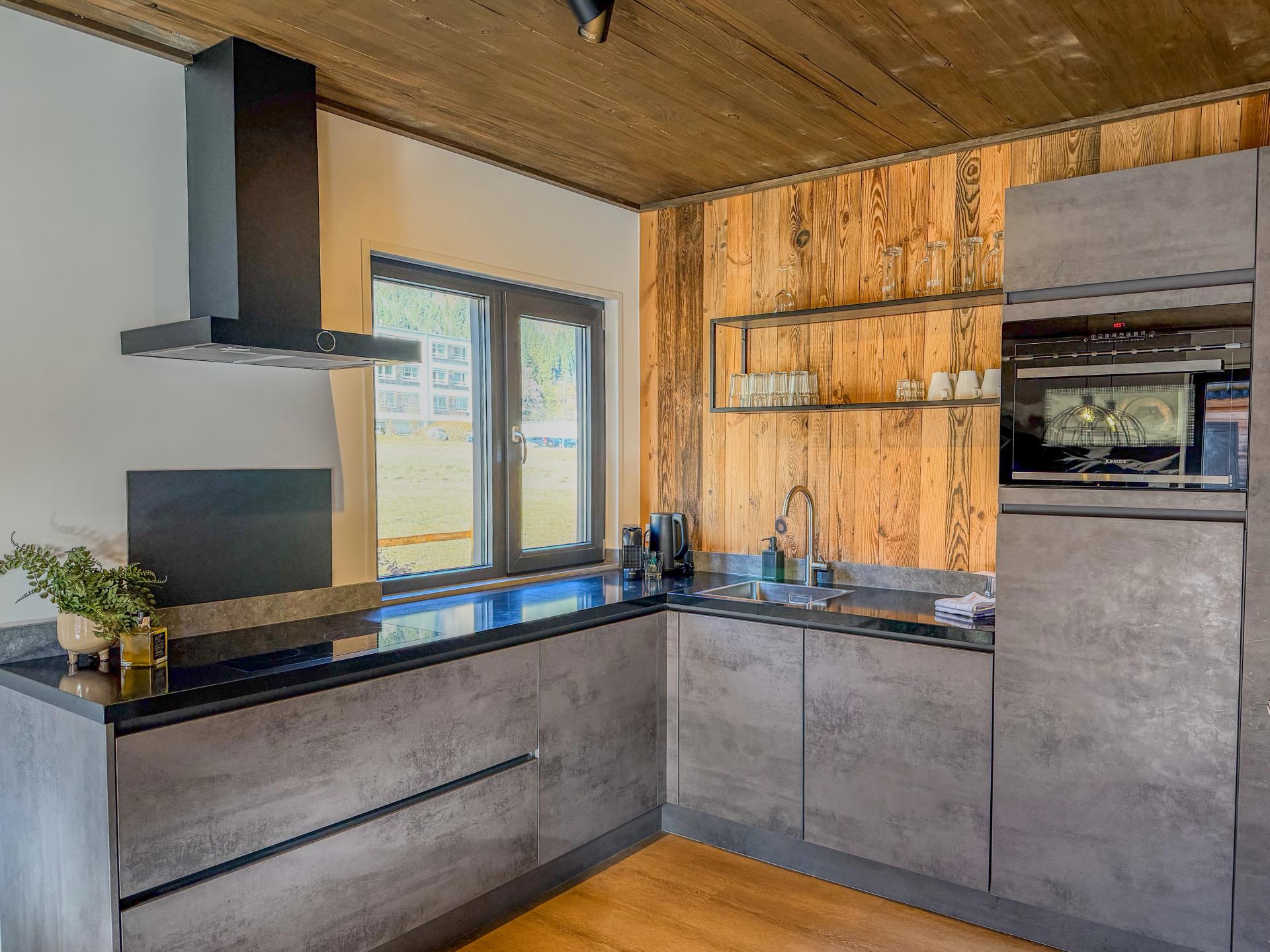 Chalet aan de Afritzer See met privé sauna en uitzicht op de Alpen - foto 25